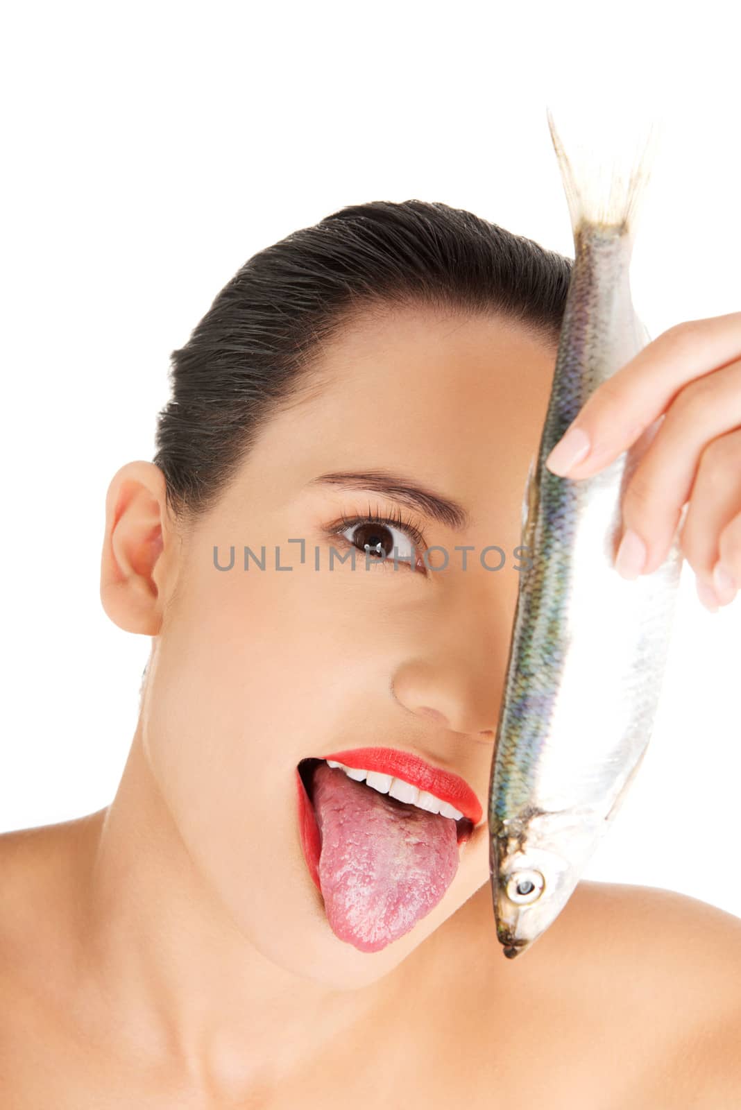 Beautiful young woman with raw fish by BDS