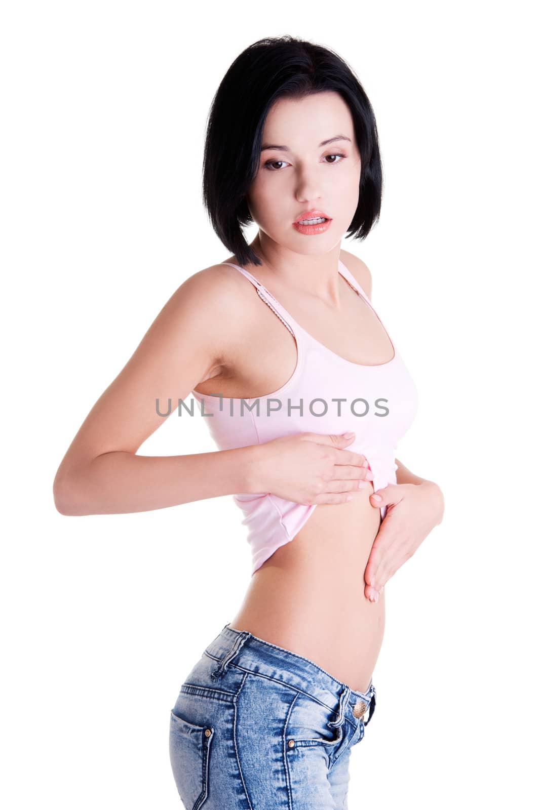 Young beautiful woman checking her belly by BDS