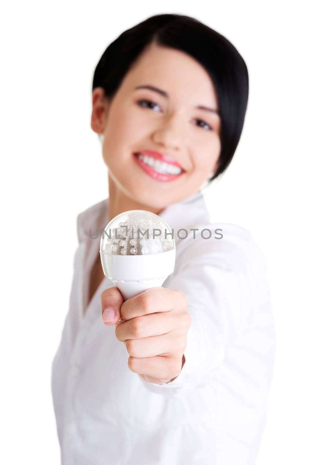 Businesswoman showing eco led bulb, isolated on white