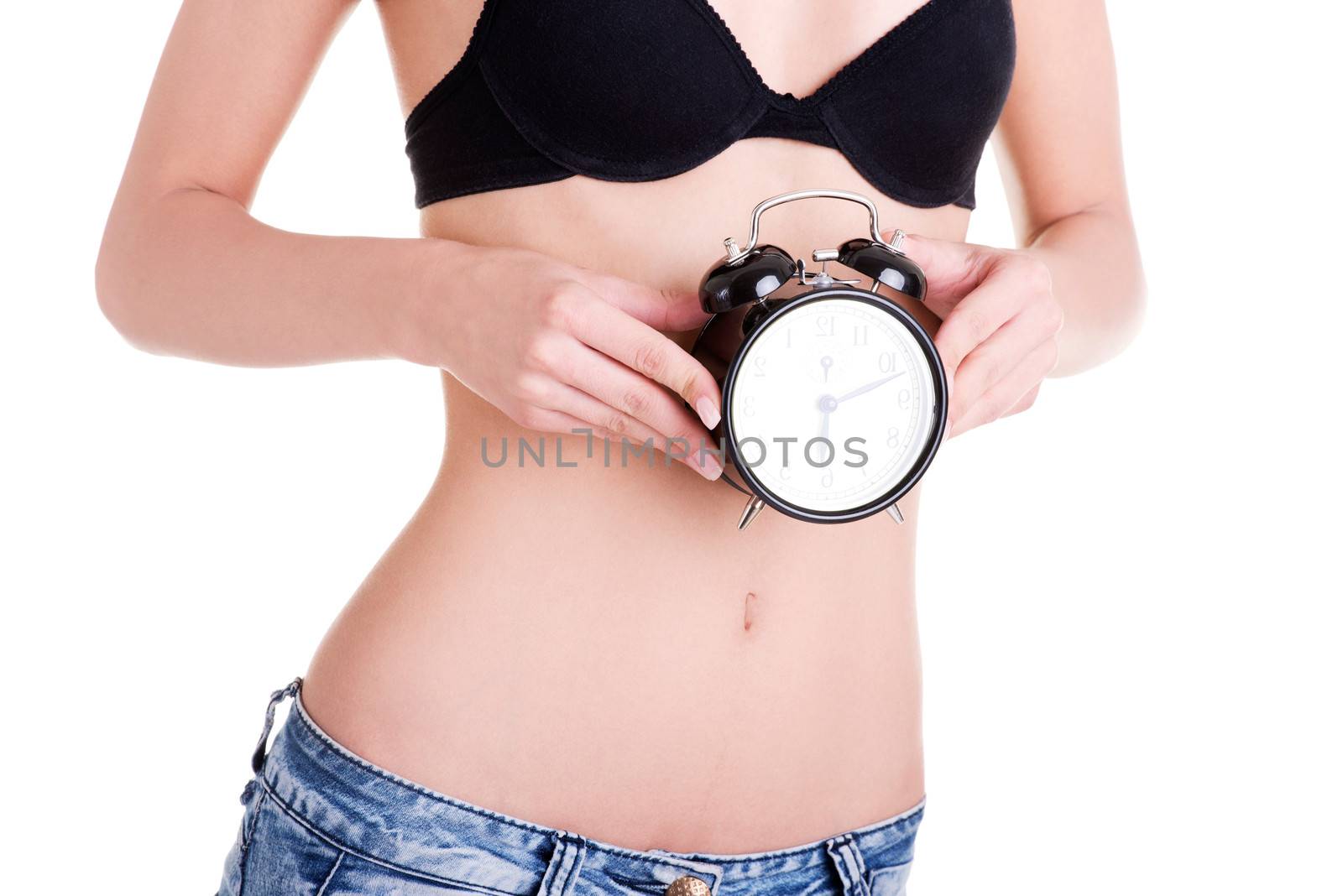 Beautiful fit woman with clock on belly by BDS
