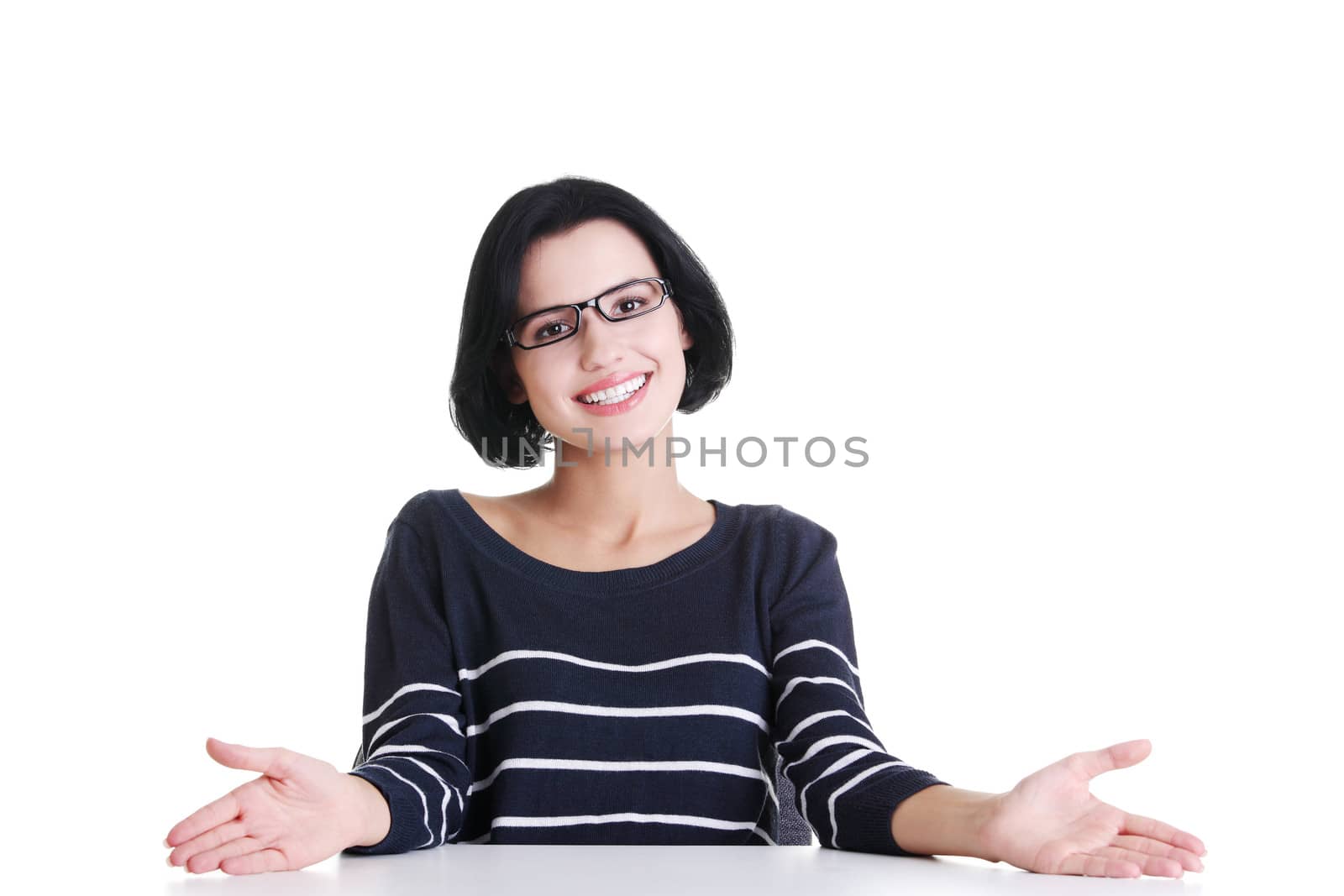 Smiling student girl sitting at the desk by BDS