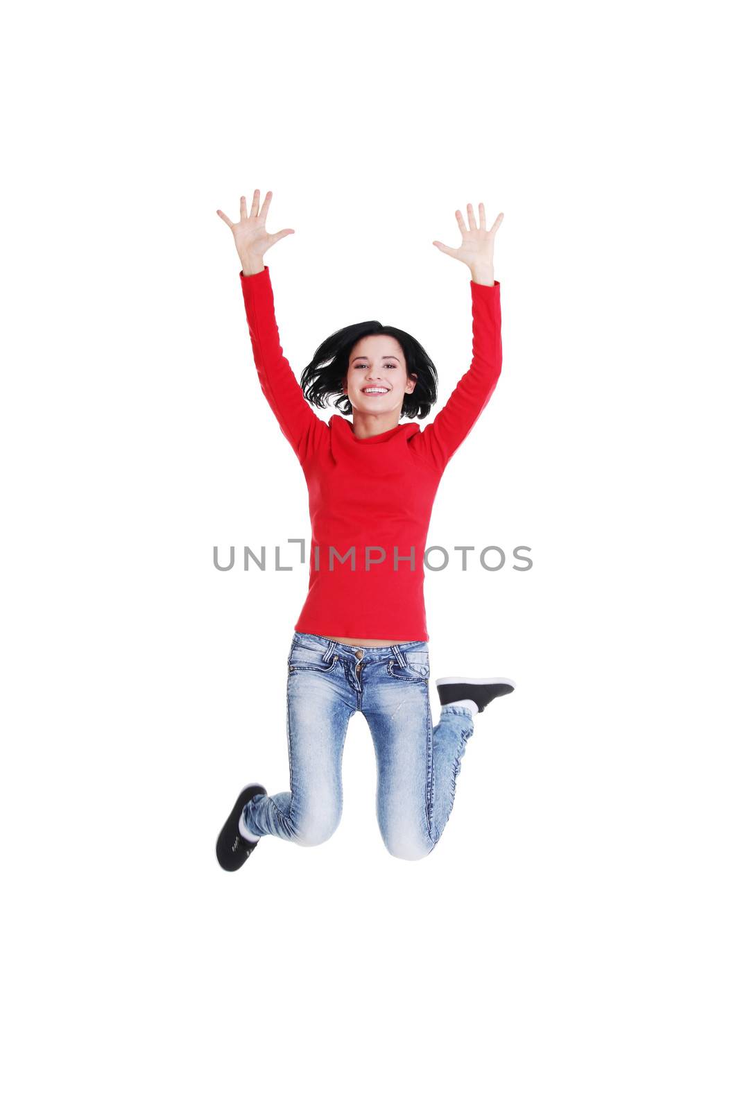 Jumping happy teen girl, isolated on white background