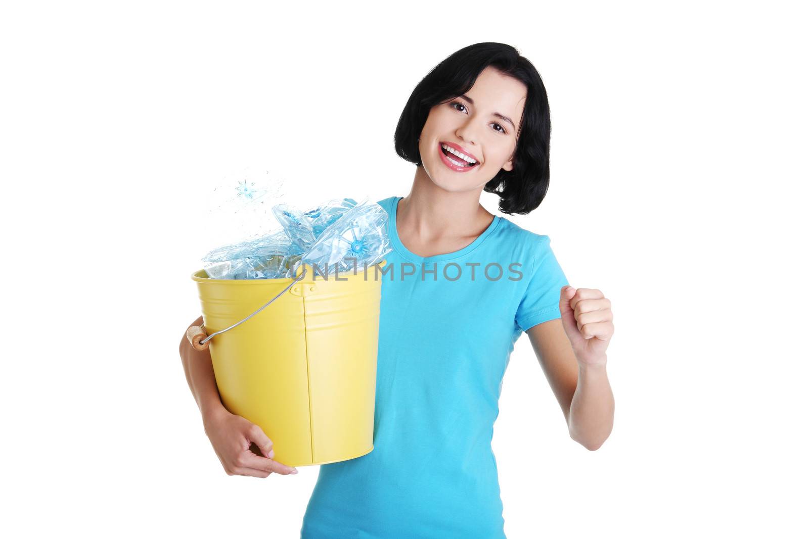 Beautiful young woman holding recycling bin isolated on white background.