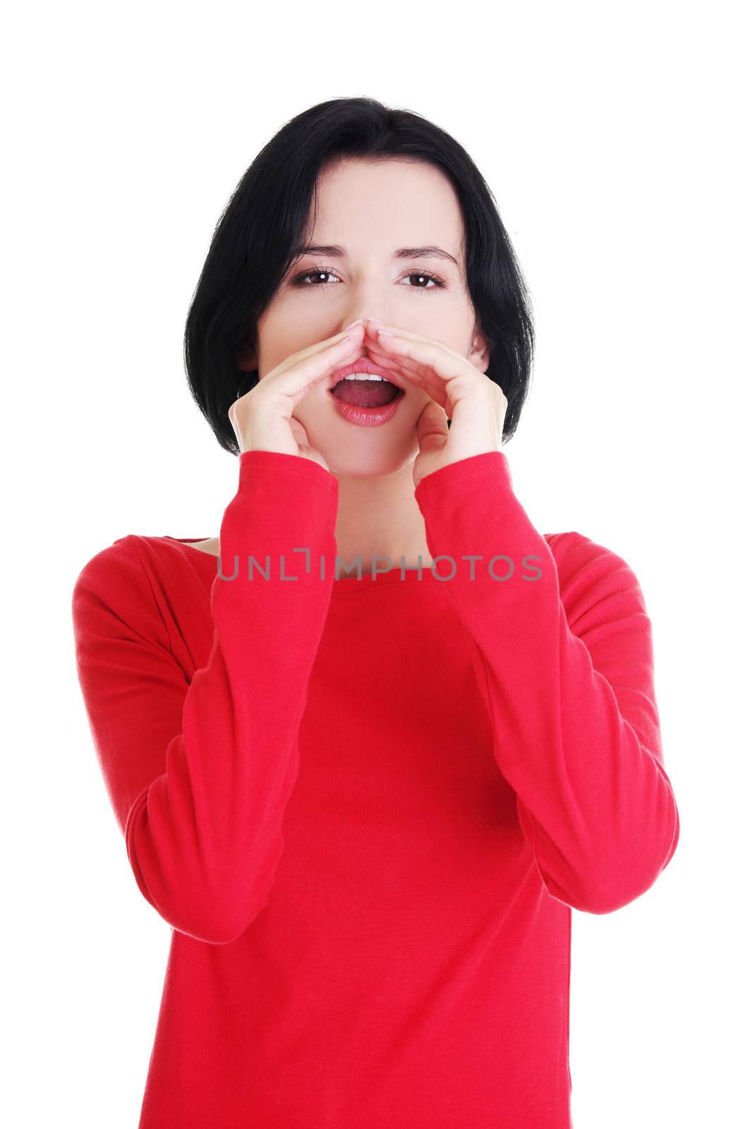 Pretty caucasian woman whispering gossip. Isolated on white.