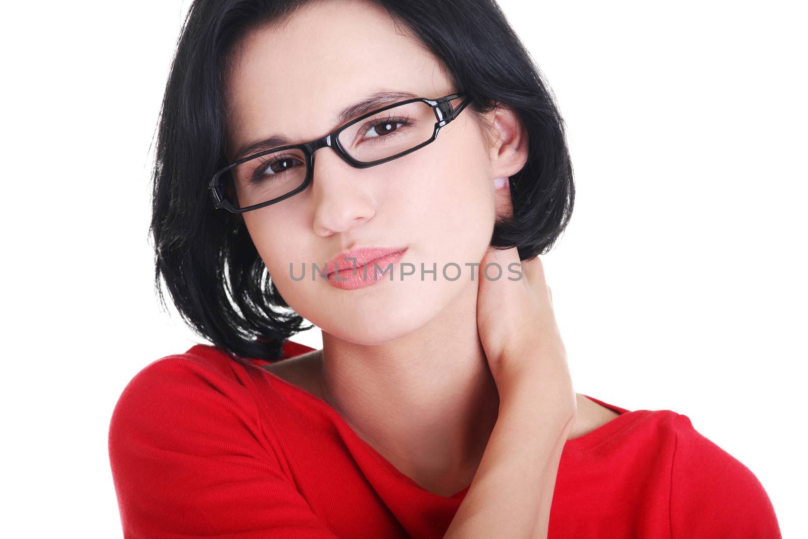 Young woman holding hand on her neck. Neck pain concept