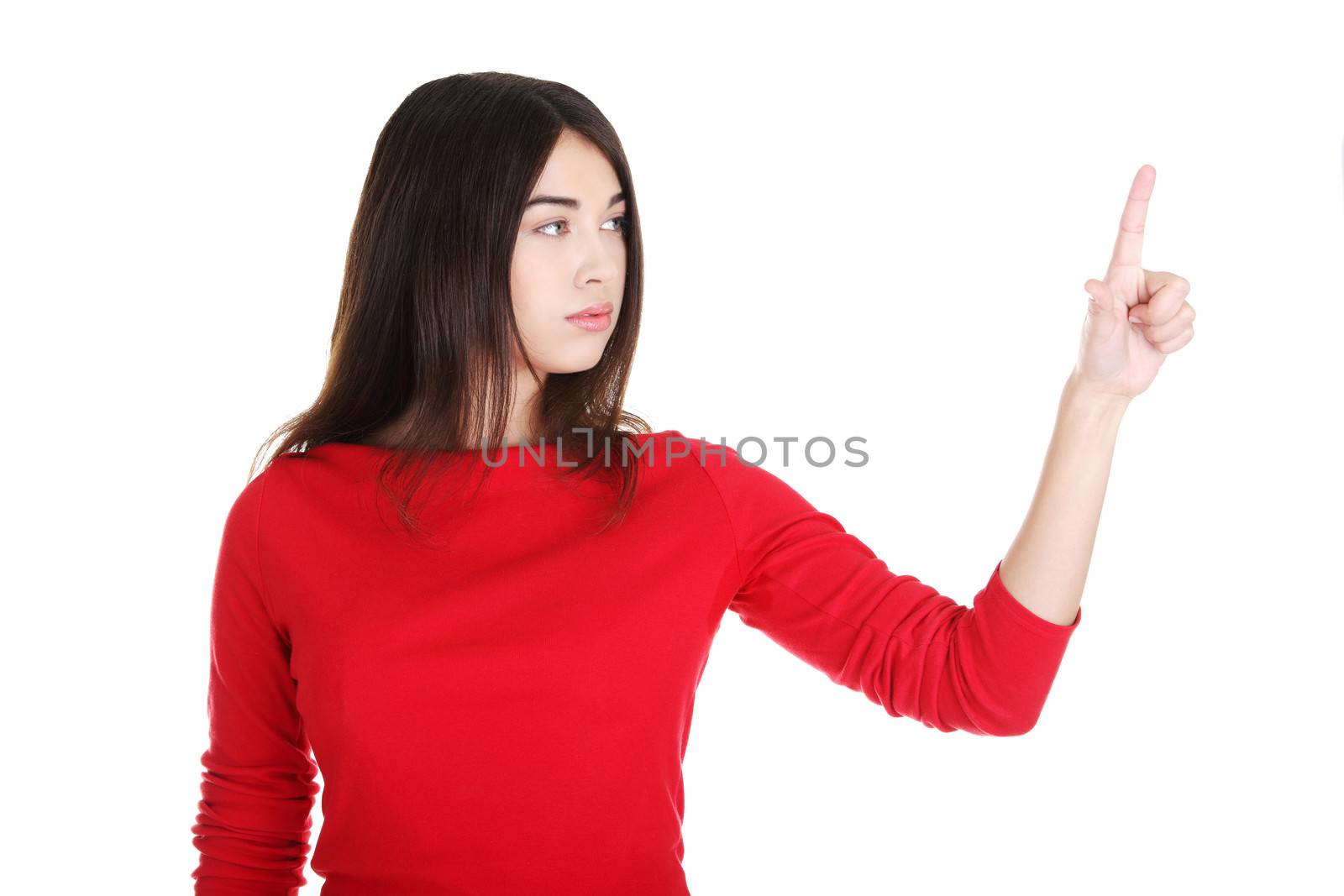 Young beautiful woman making choose on abstract screen