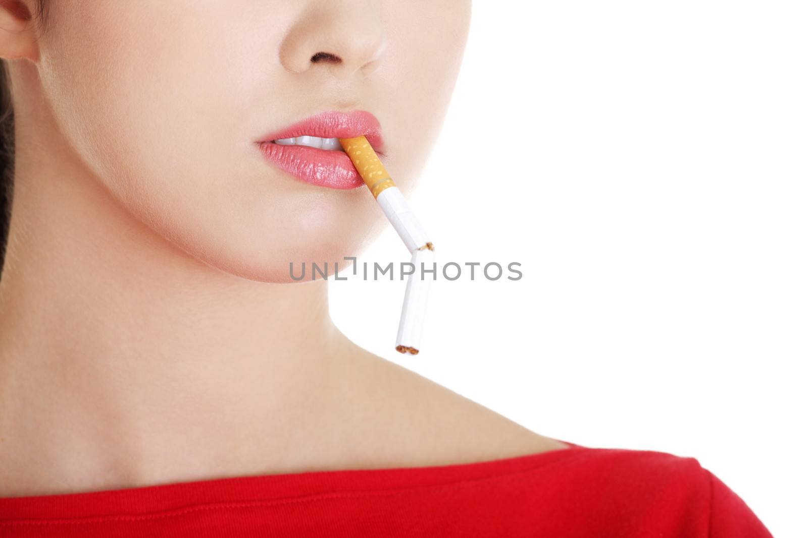 Young woman with broken cigarette. by BDS