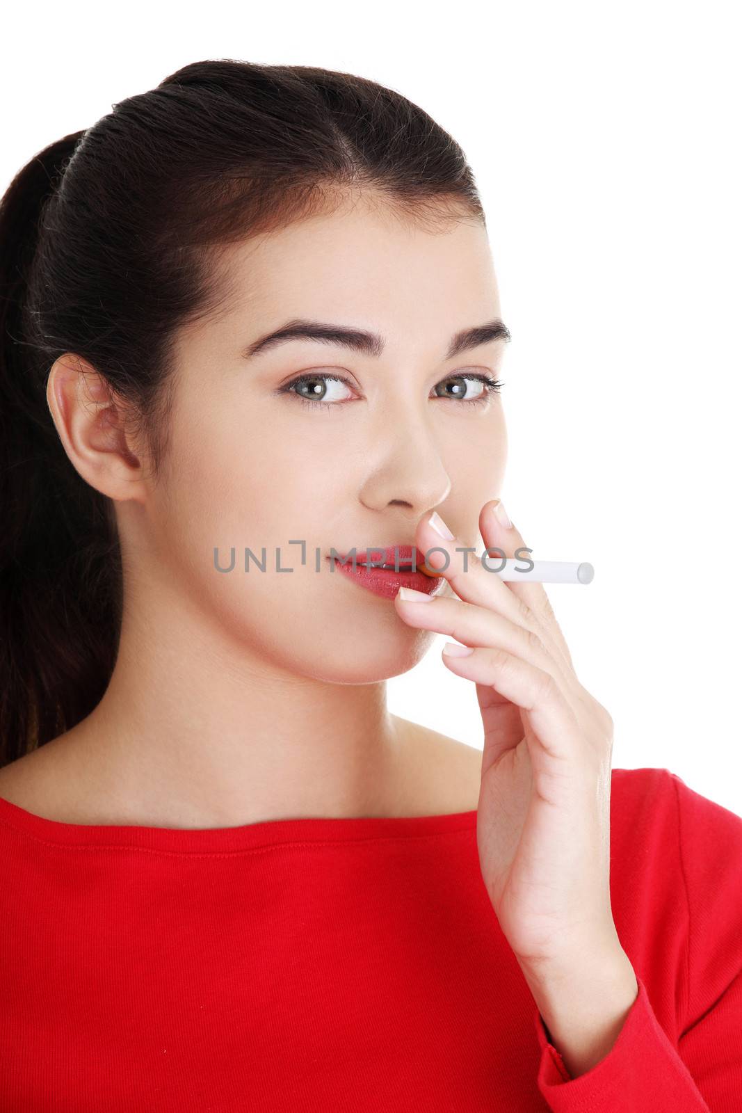 Young woman smoking electronic cigarette by BDS