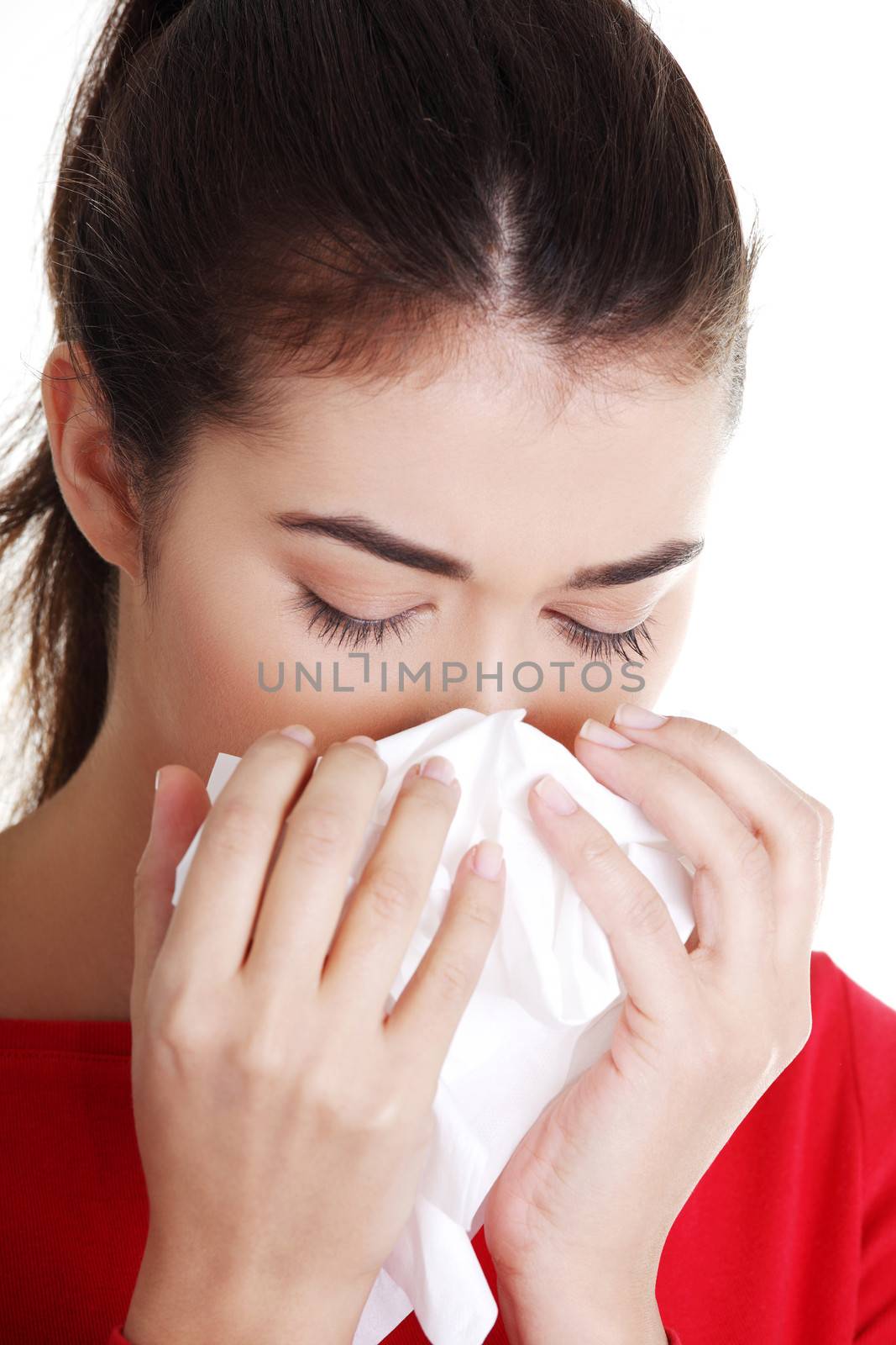 Teen woman with allergy or cold , isolated on white