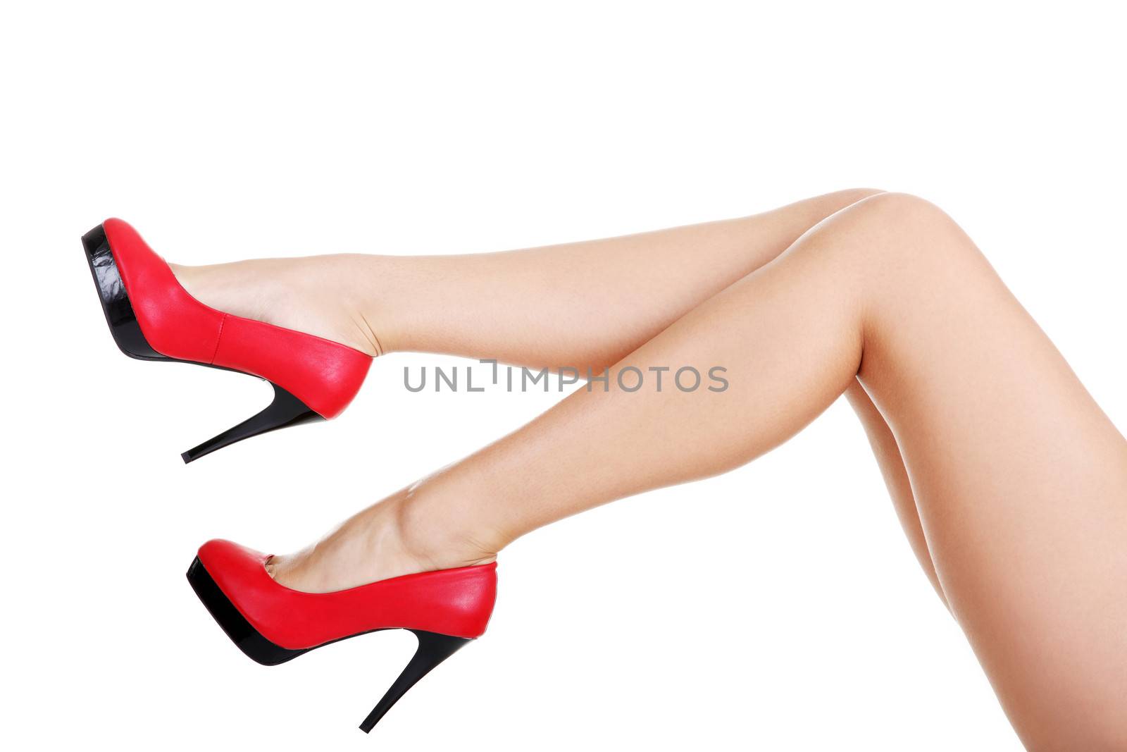 Woman's leg and high heel shoes by BDS