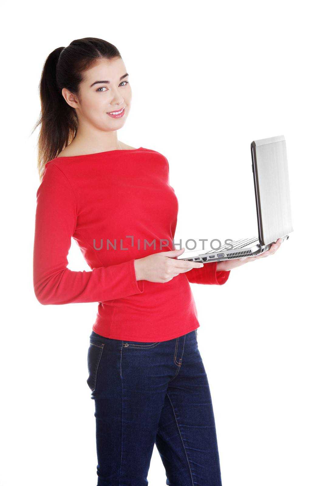 Young attractive woman working on her laptop computer