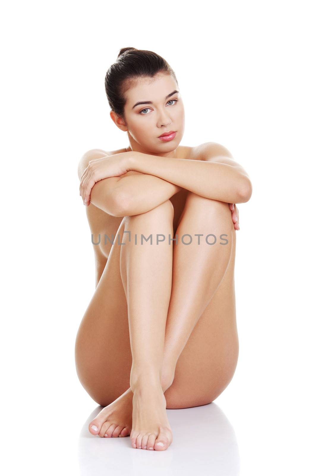 Sexy fit naked woman with healthy clean skin, isolated on white background