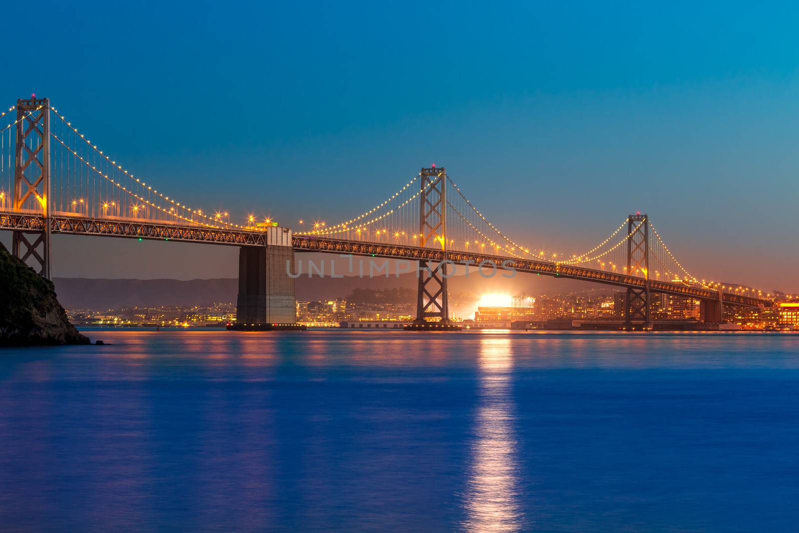 Bay Bridge at sunset in San Francisco from Treasure Island California USA