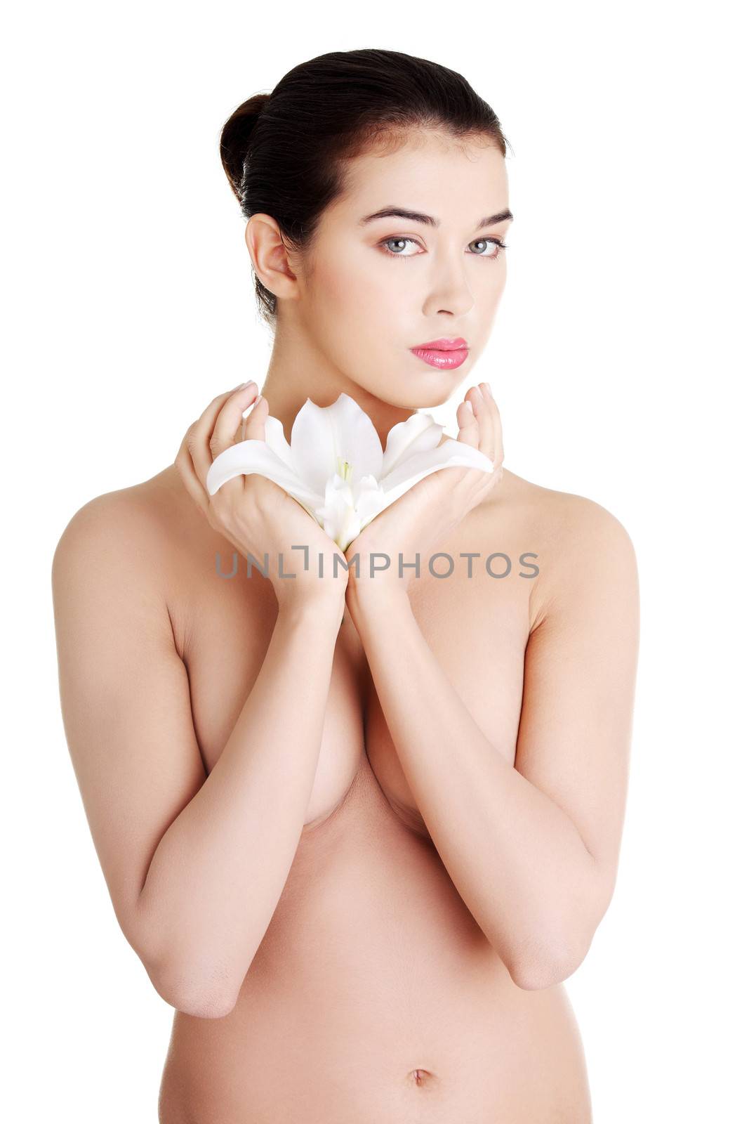 Portrait of beautiful young woman with health skin holding lily flower , isolated on white