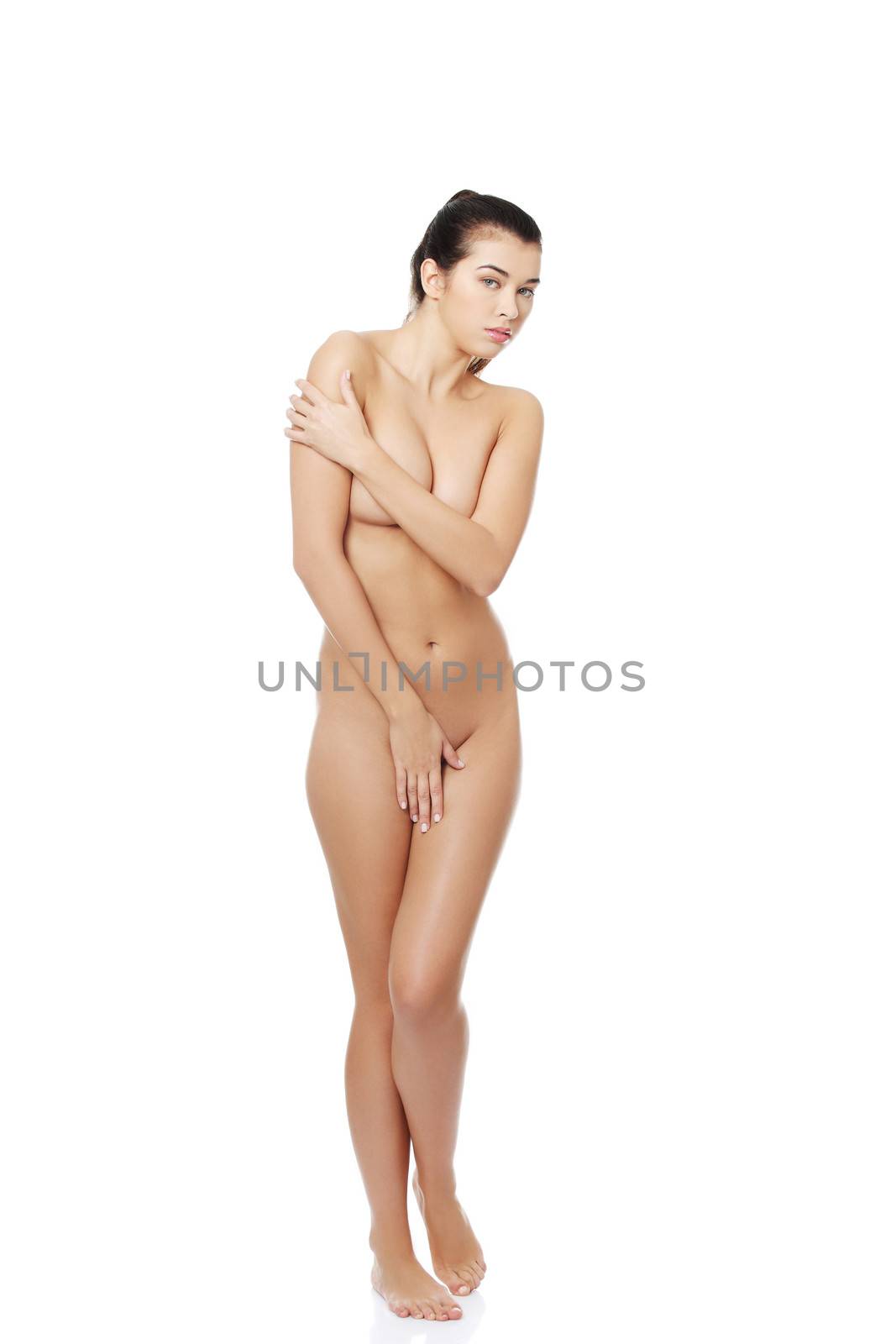 Sexy fit naked woman with healthy clean skin, isolated on white