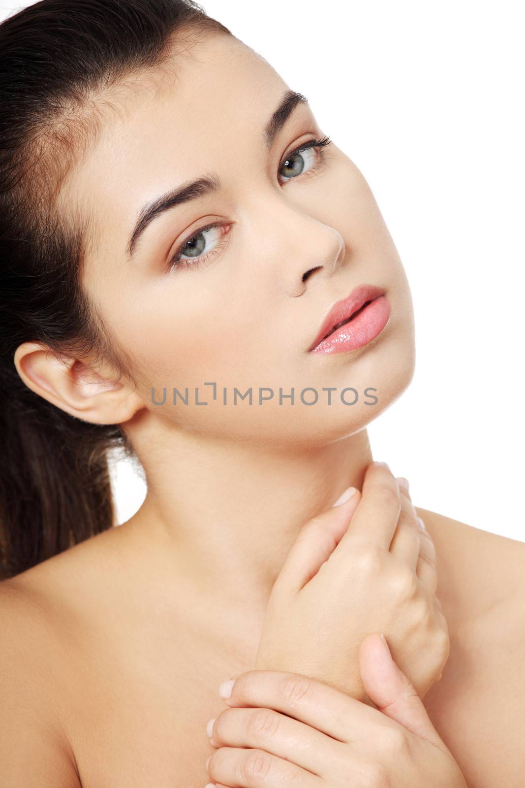 Portrait of a beautiful female model on white background