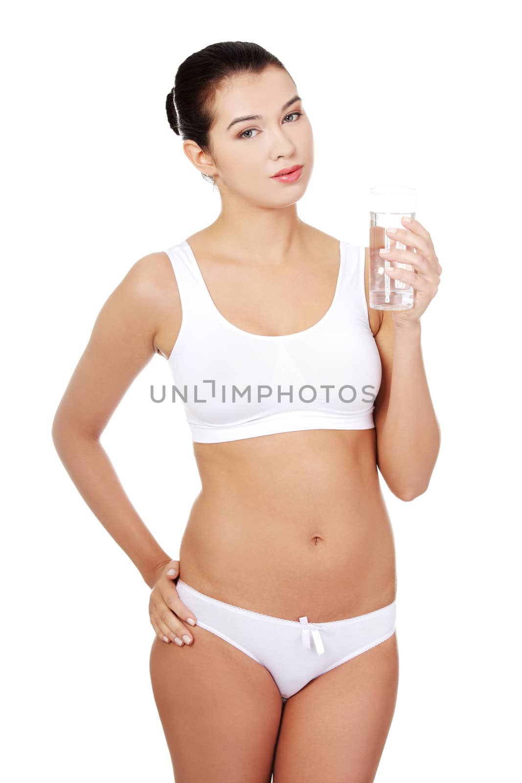 Woman in underwear with glass of mileral water by BDS