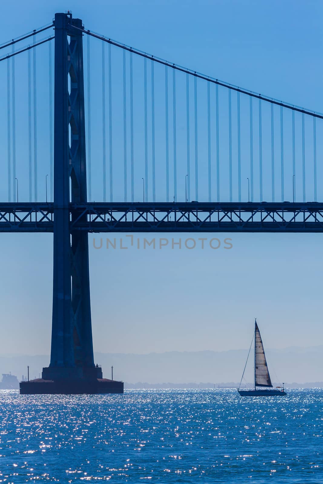 San Francisco Bay bridge sailboat from Pier 7 California by lunamarina