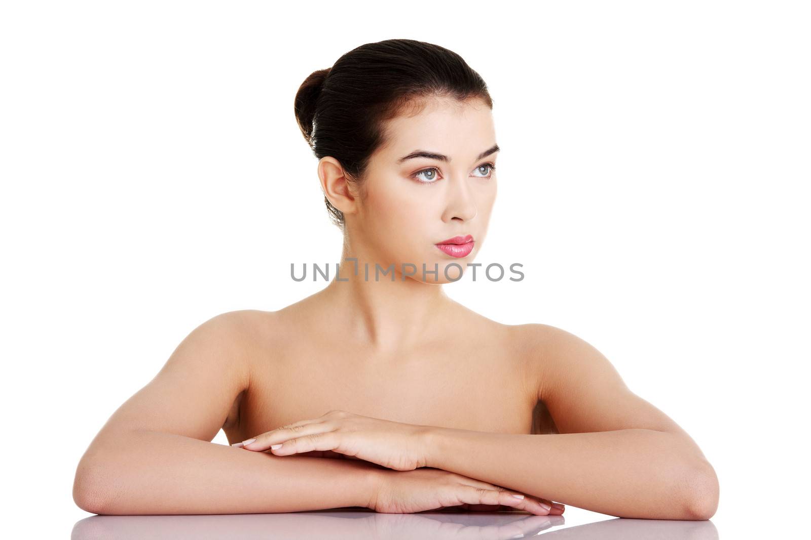 Portrait of a beautiful female model on white background