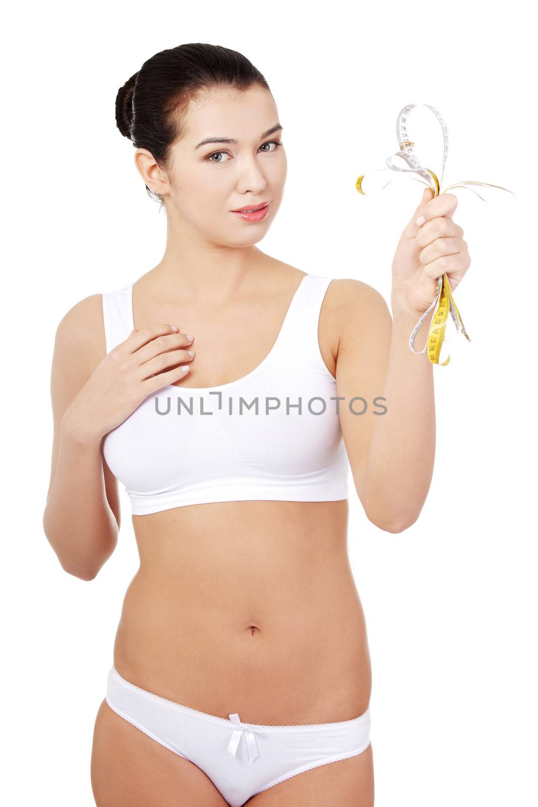 Pretty smiling woman holding measurement type by BDS