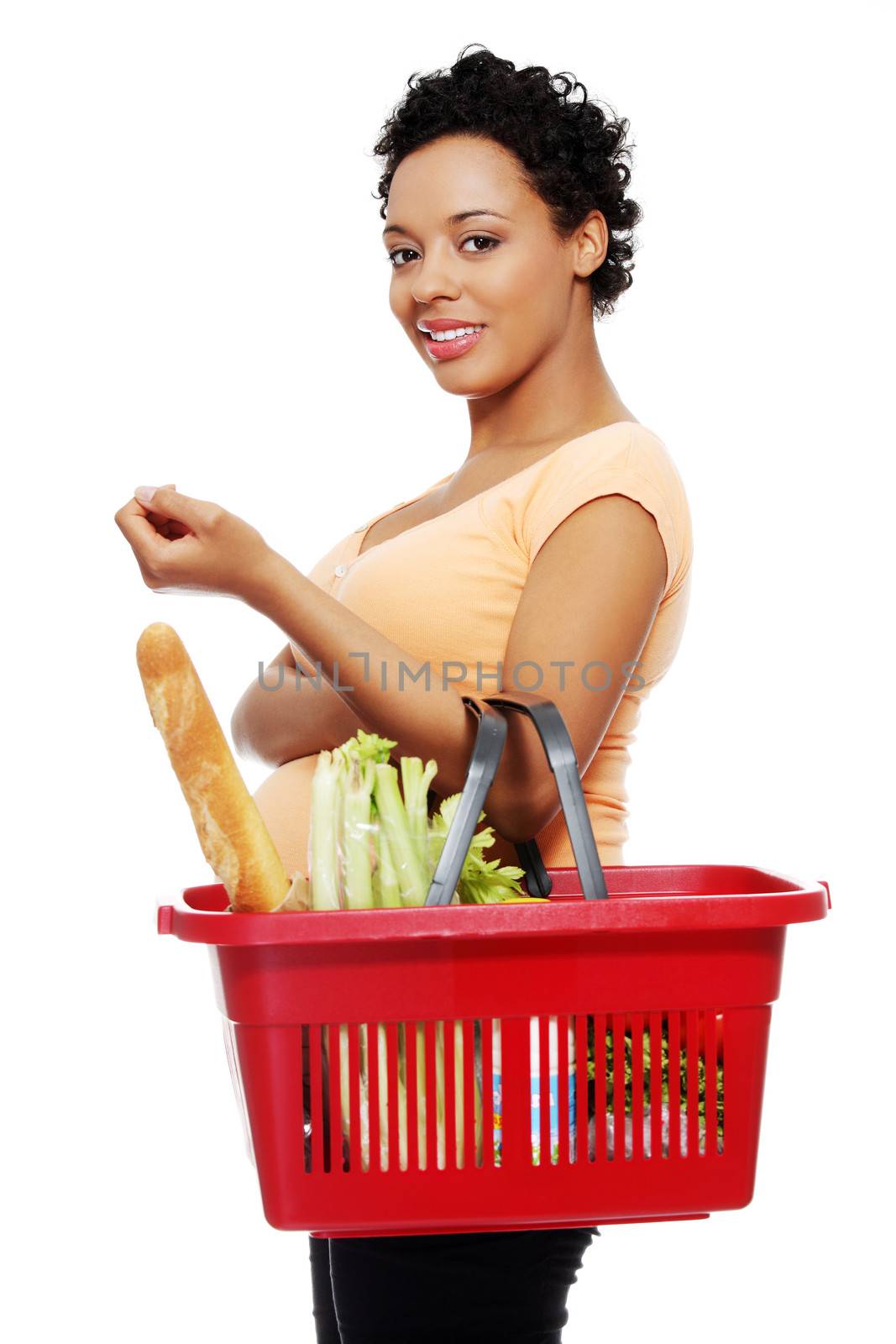 Pregnant woman with shopping basket, isolated on white