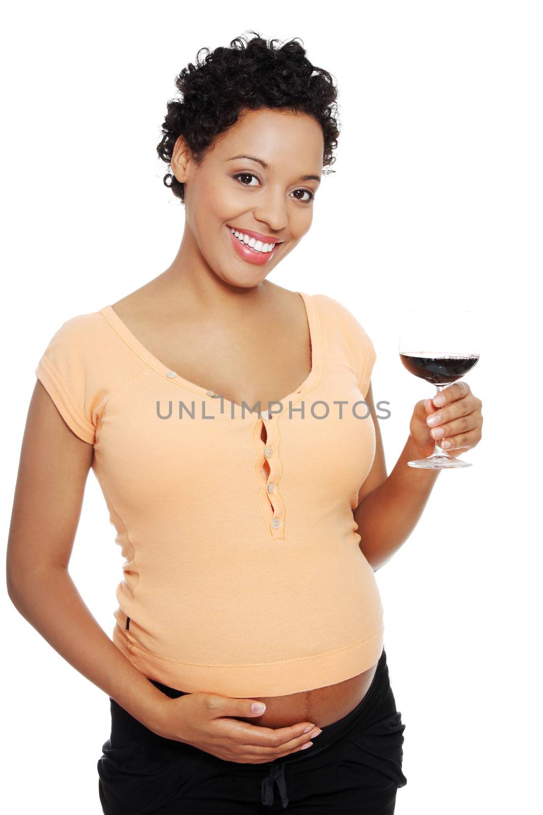 Pregnant woman holding glass of alcohol ( wine ), isolated on white