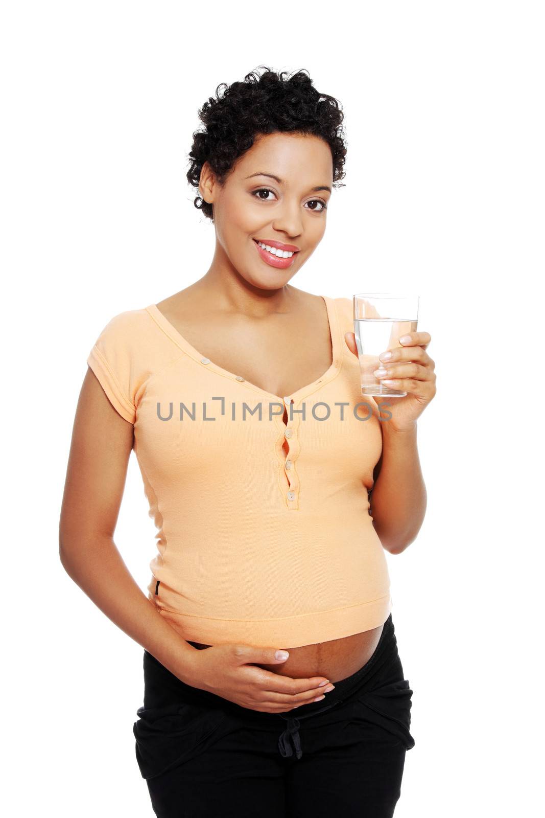 Pregnant woman with glass of water , isolated on white