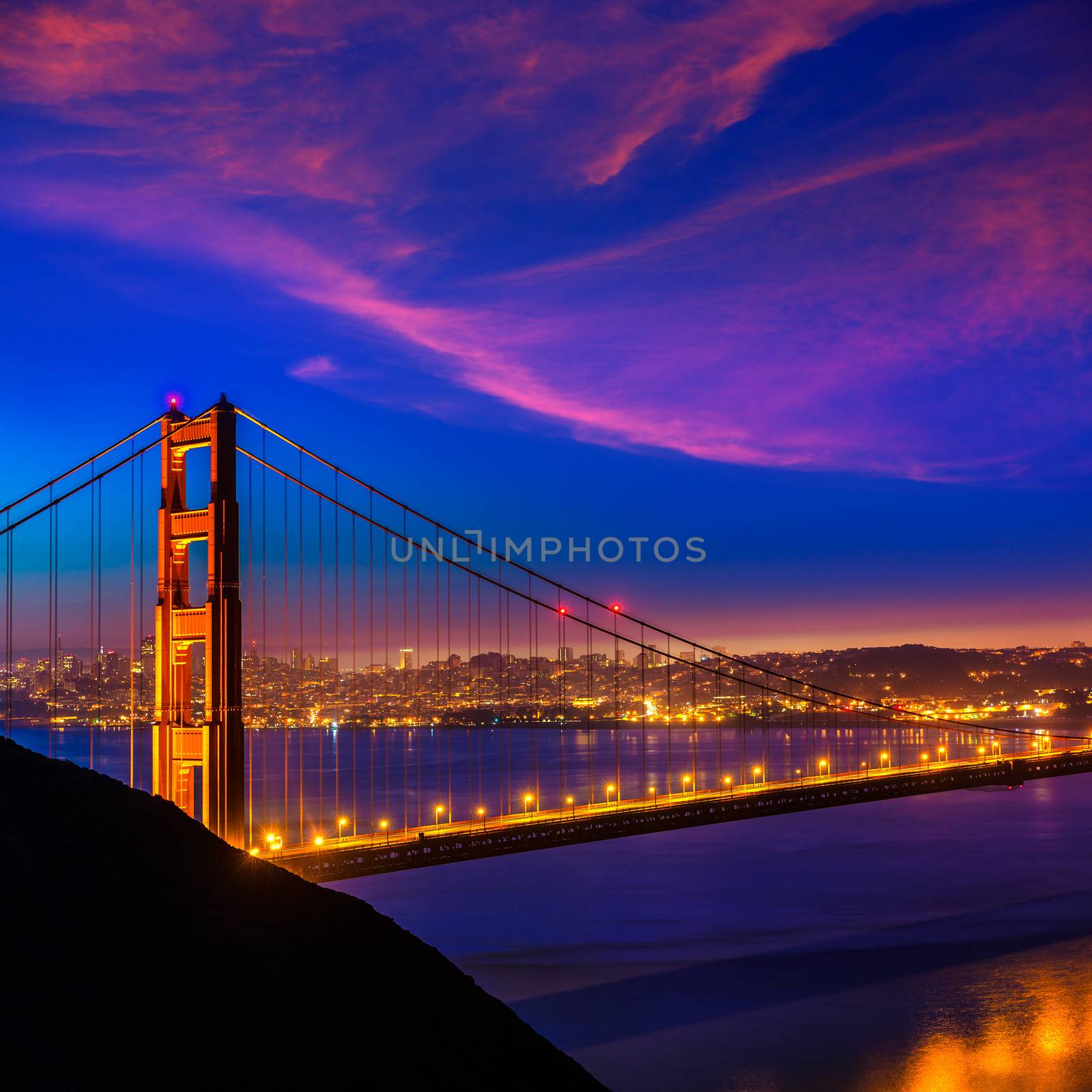 Golden Gate Bridge San Francisco sunset through cables by lunamarina