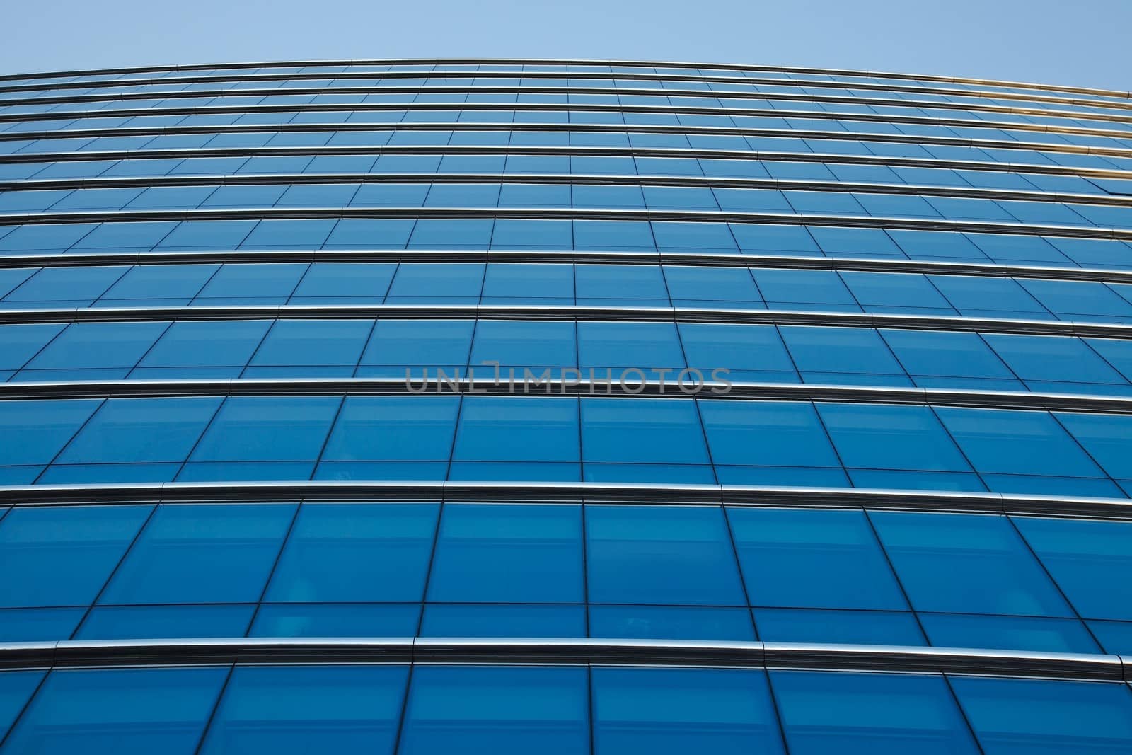 Modern office building detail, glass surface