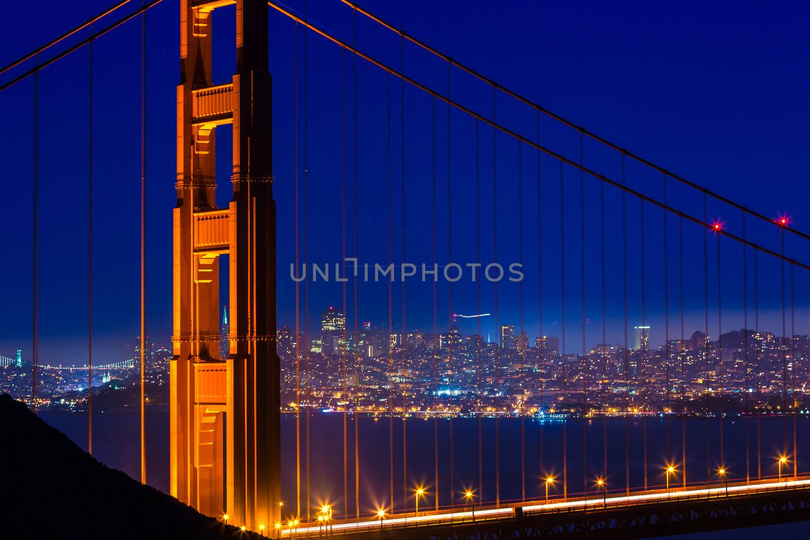 Golden Gate Bridge San Francisco sunset through cables by lunamarina