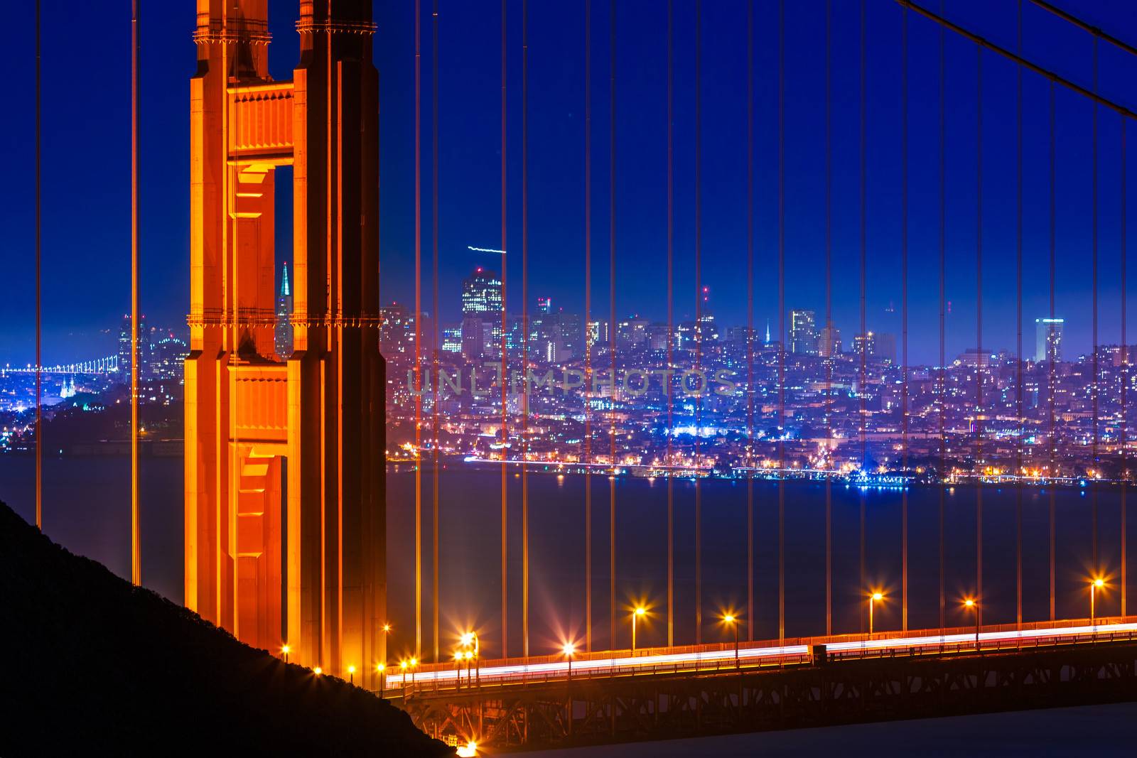 Golden Gate Bridge San Francisco sunset view through cables in California USA