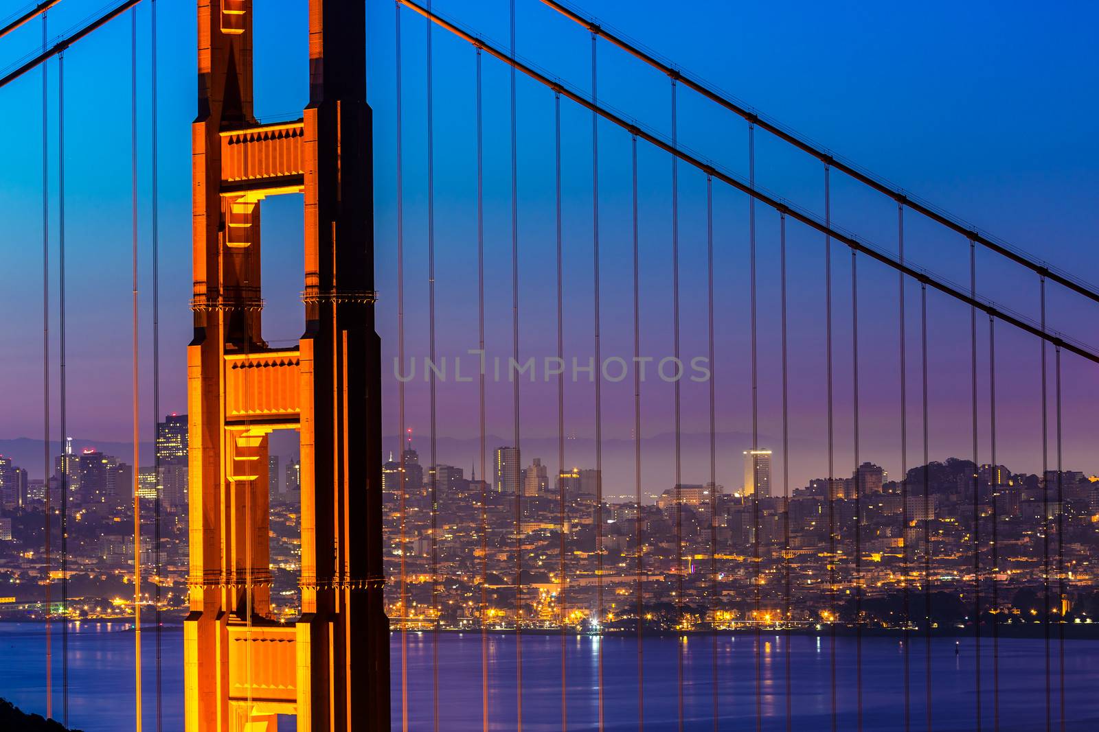 Golden Gate Bridge San Francisco sunset through cables by lunamarina