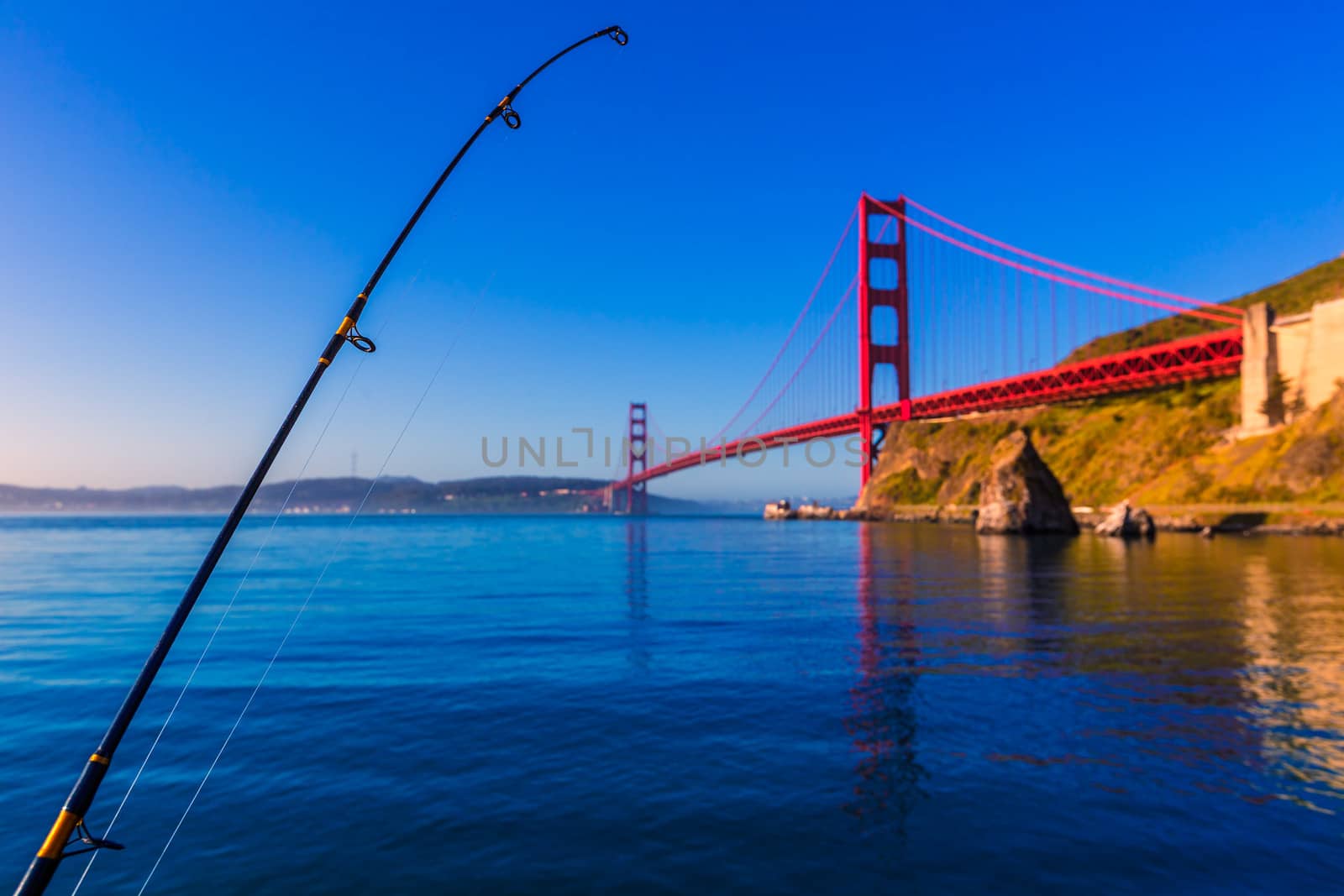 San Francisco Golden Gate Bridge with fishing rod California USA