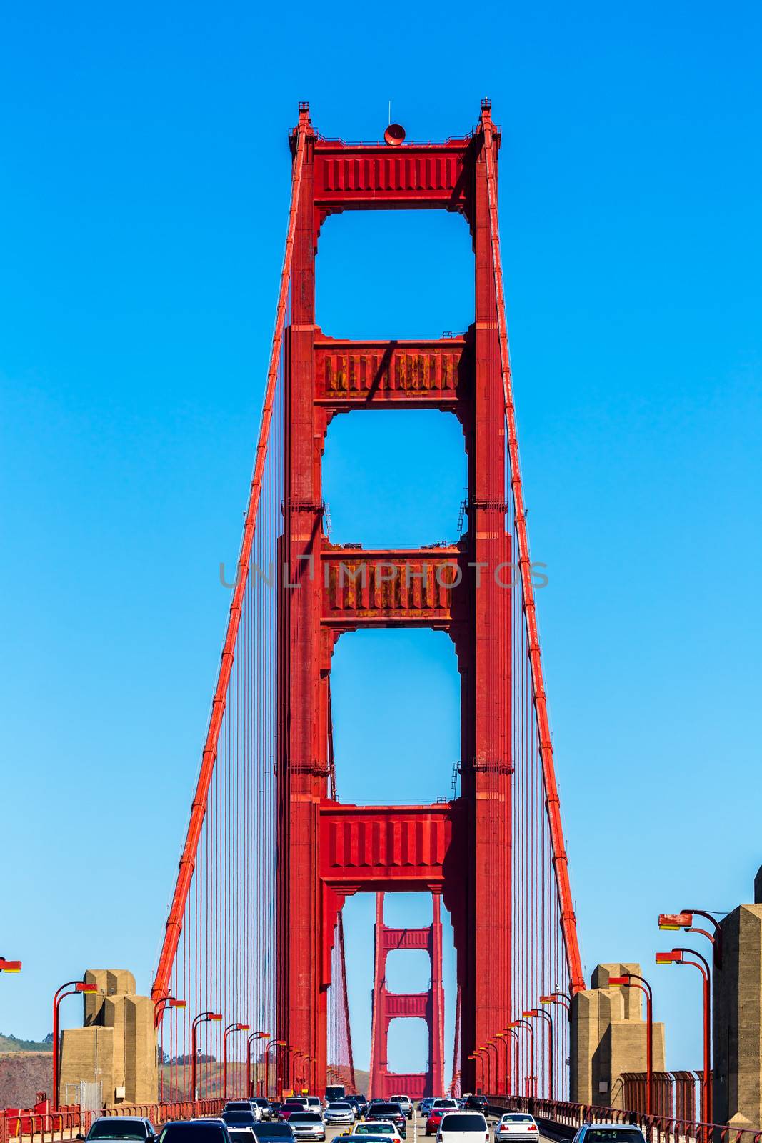 Golden Gate Bridge traffic in San Francisco California by lunamarina
