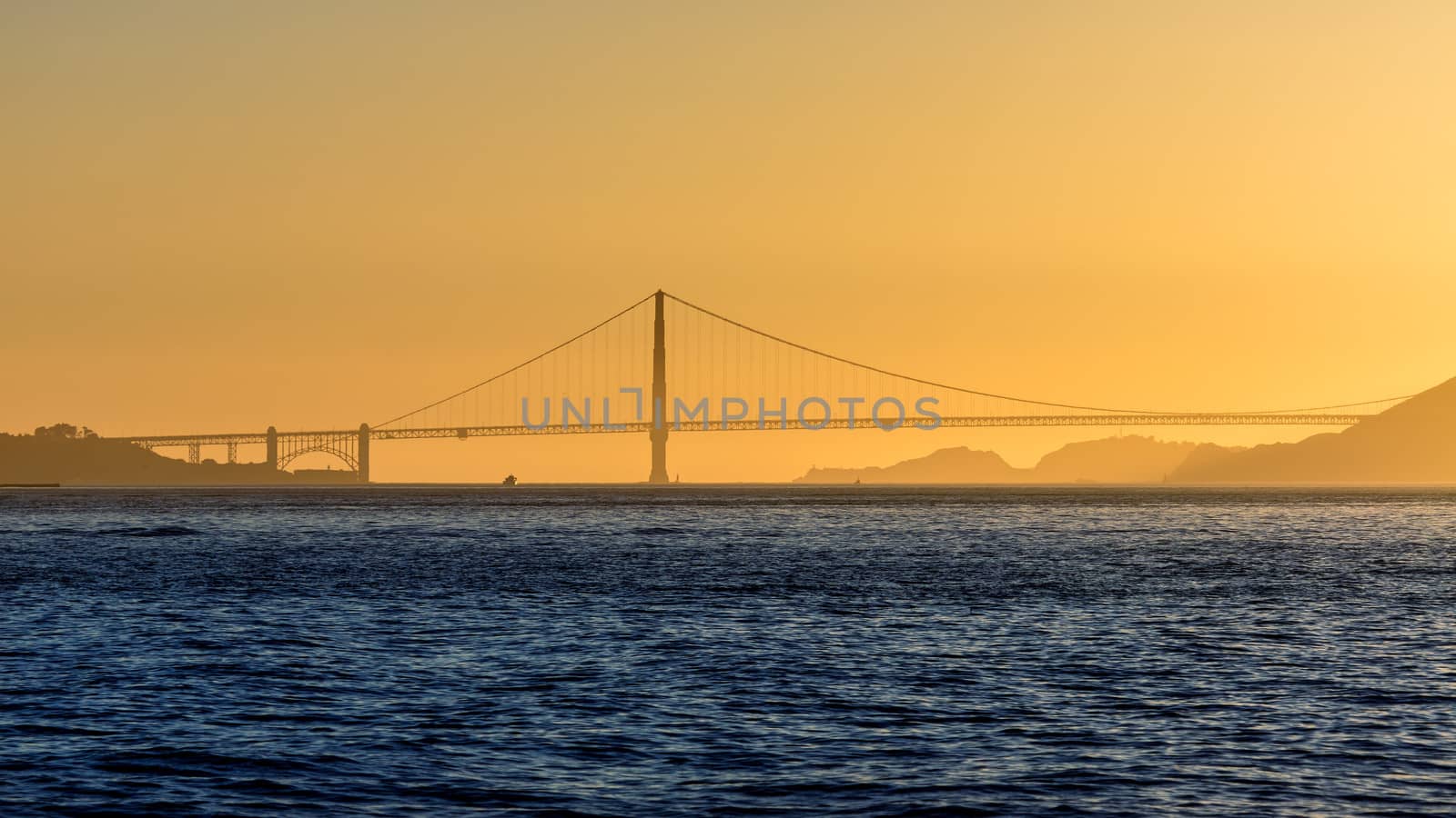 Golden Gate bridge sunset in San Francisco California by lunamarina