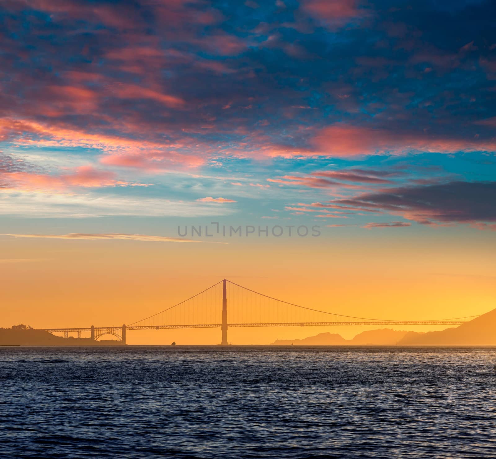 Golden Gate bridge sunset in San Francisco California by lunamarina