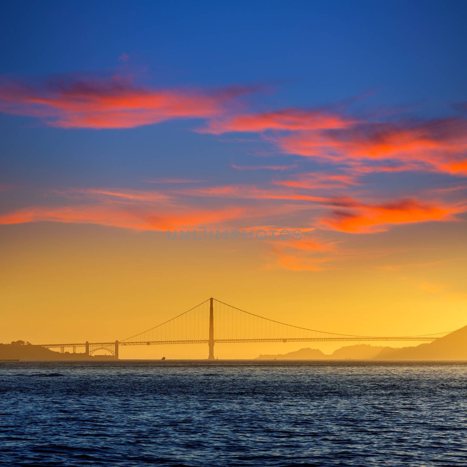 Golden Gate bridge sunset in San Francisco California by lunamarina