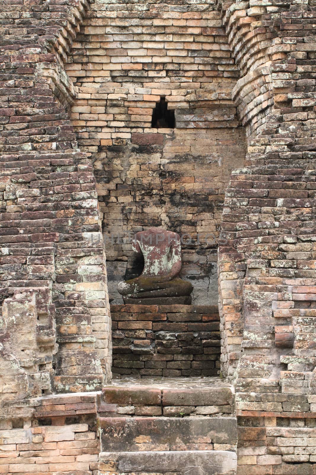 Old ruin Buddha statue in Thailand