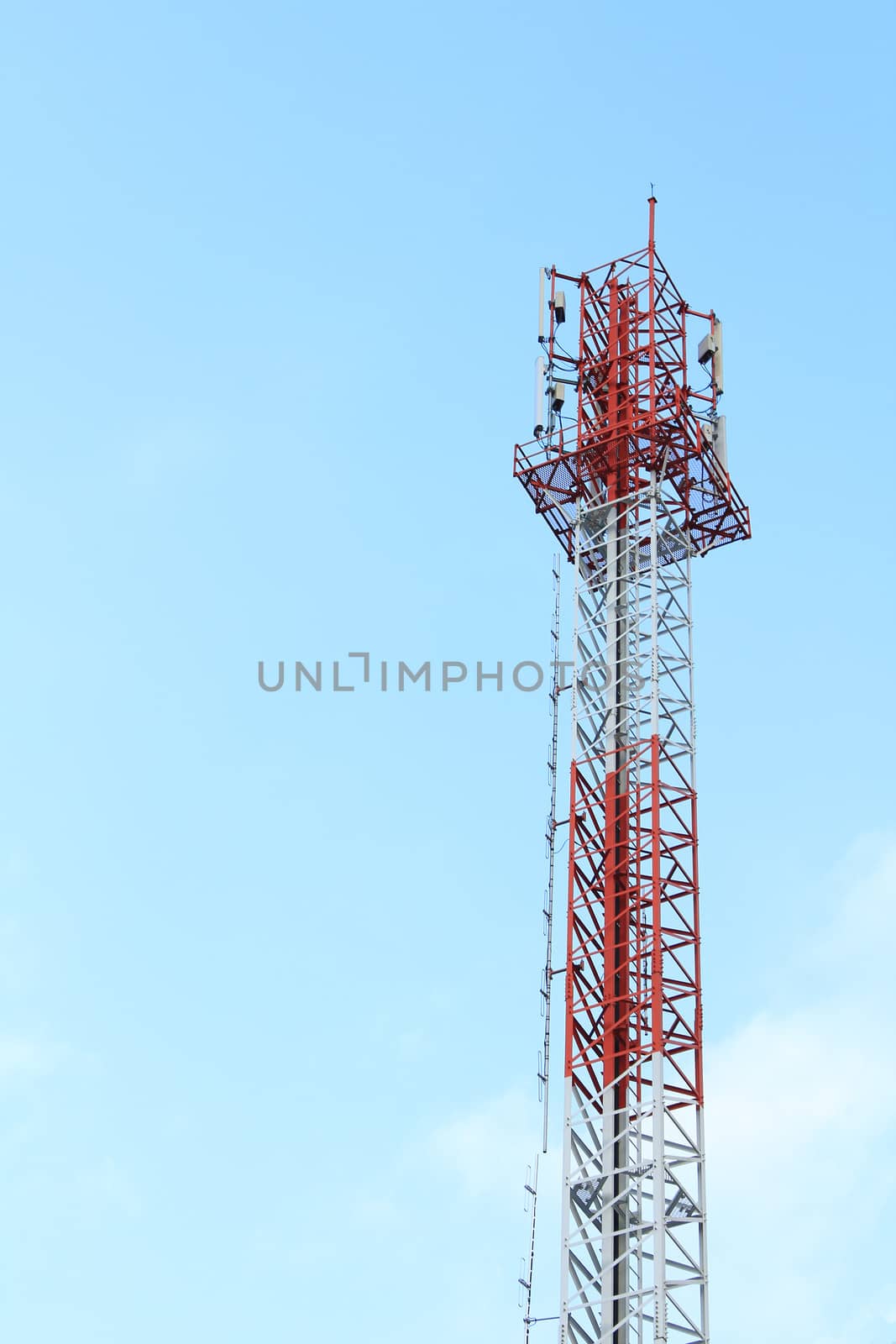 Communication tower against a blue sky