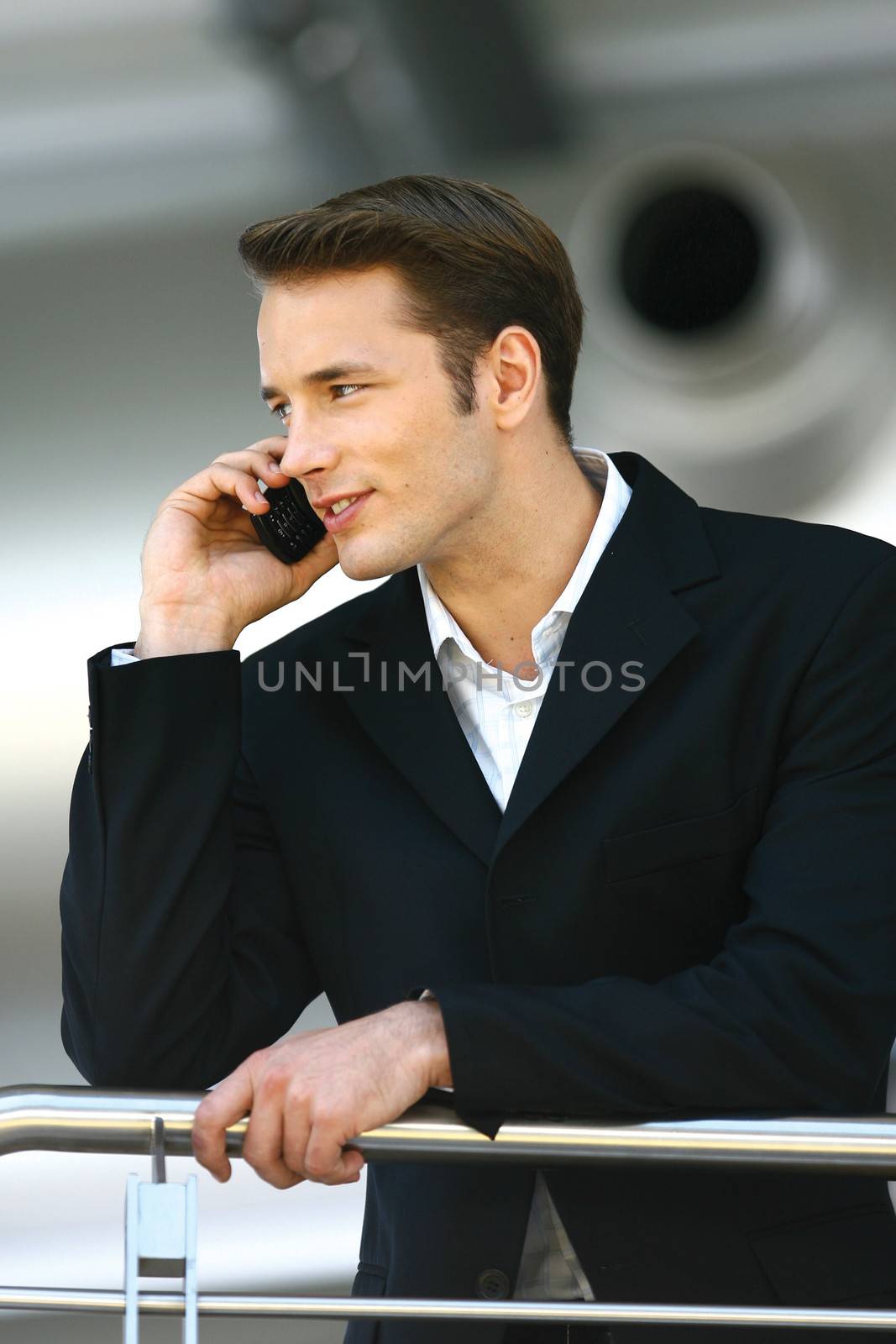 young man enjoying a conversation over the cellphone