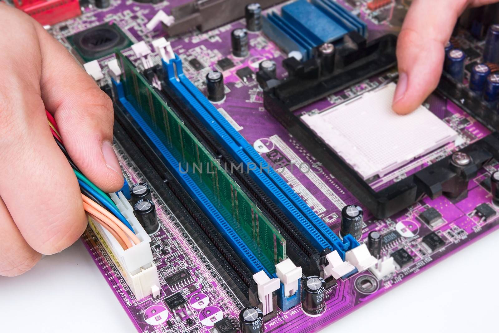 Technician repairing computer hardware