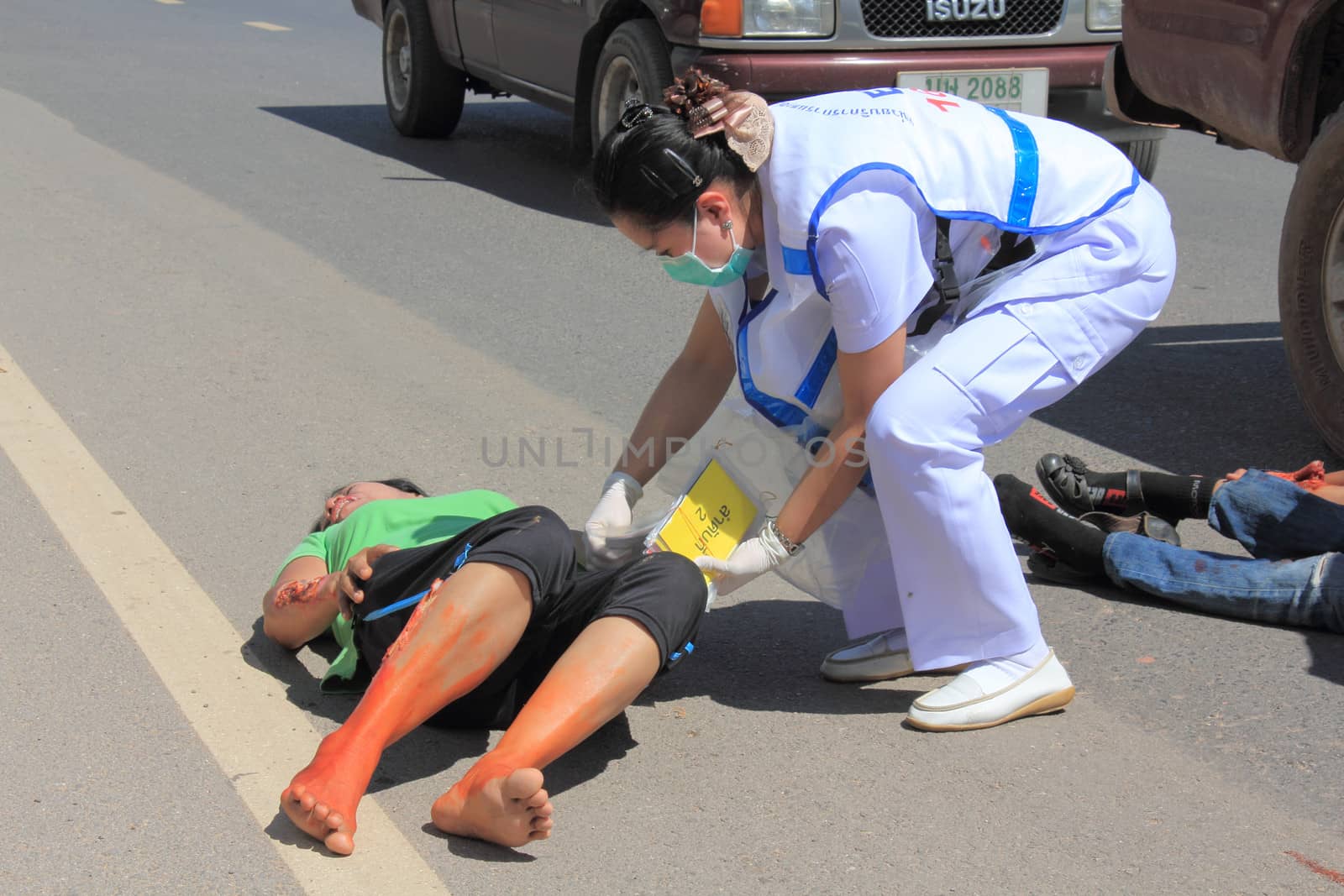 SURAT THANI, THAILAND - OCTOBER 4 : Practicing fire protection plan and rescue car accident on October 4, 2012 in Surat Thani, Thailand.
