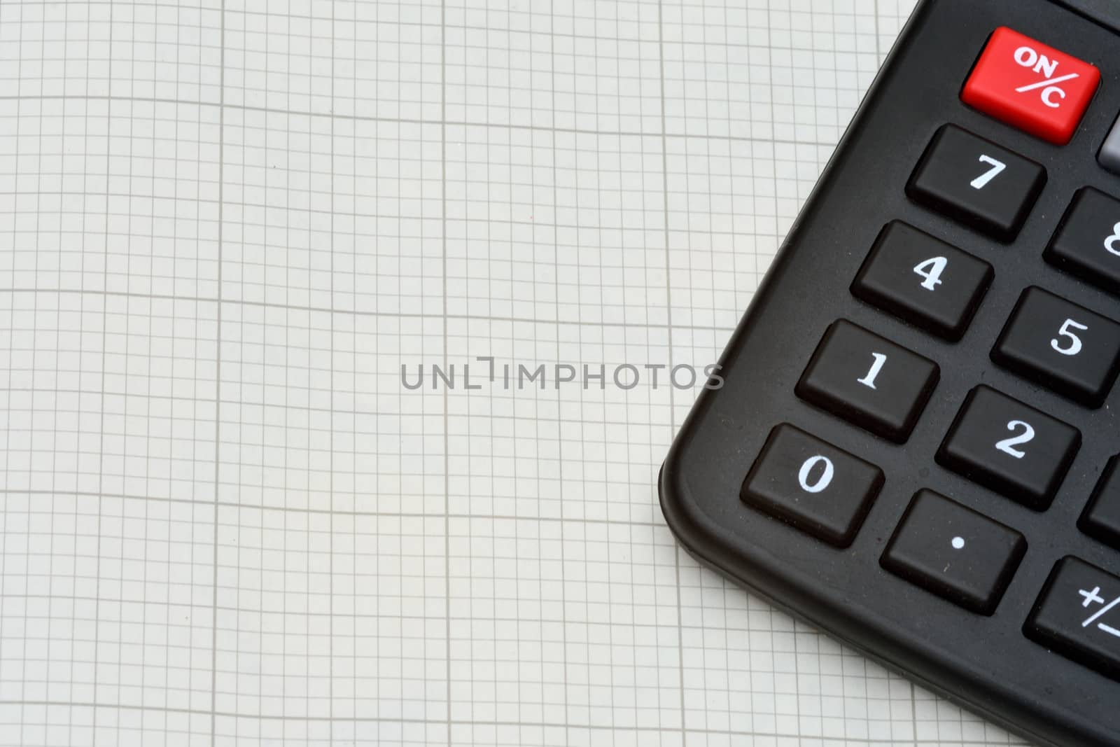 Detail of calculator and graph paper
