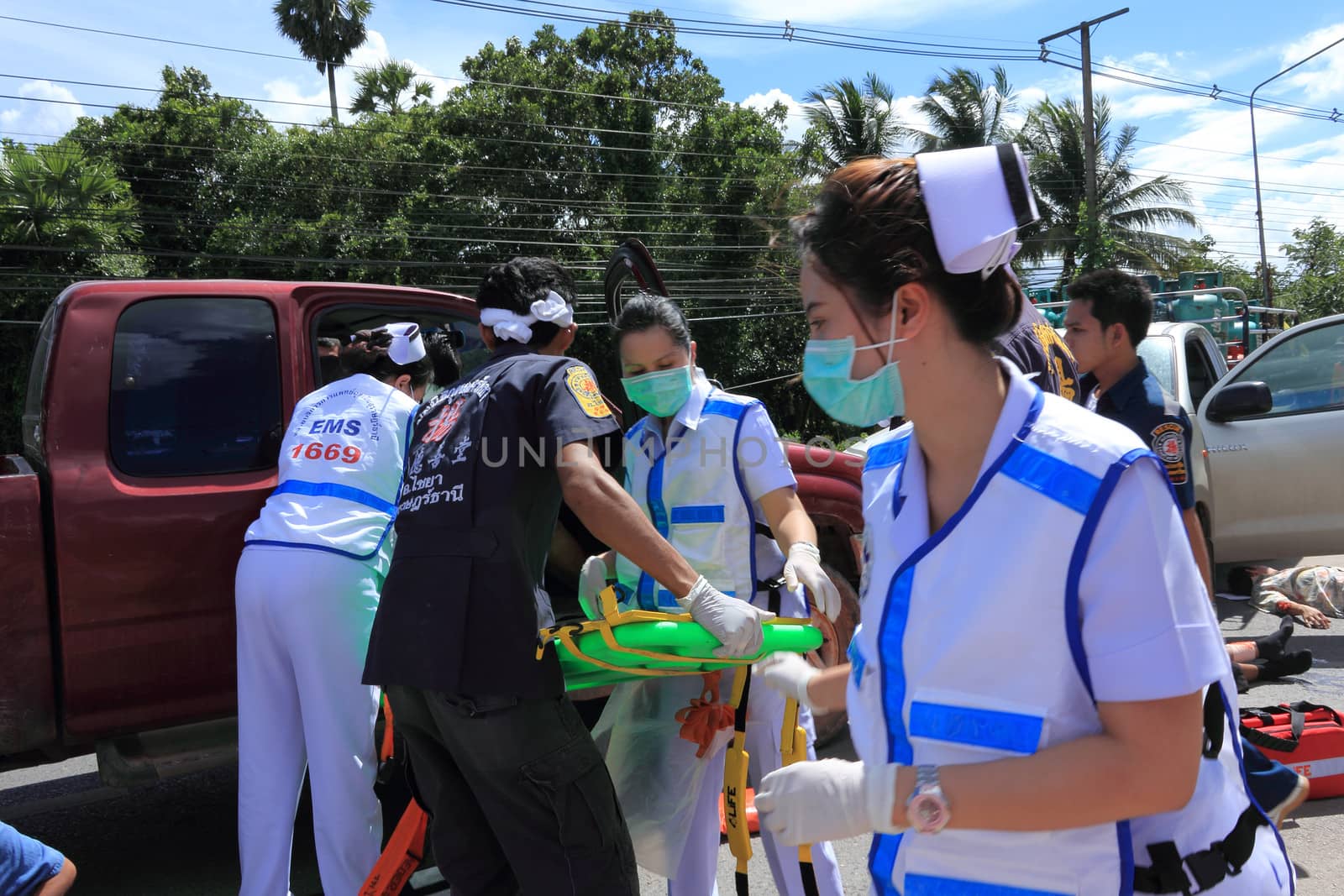 SURAT THANI, THAILAND - OCTOBER 4 : Practicing fire protection plan and rescue car accident on October 4, 2012 in Surat Thani, Thailand.