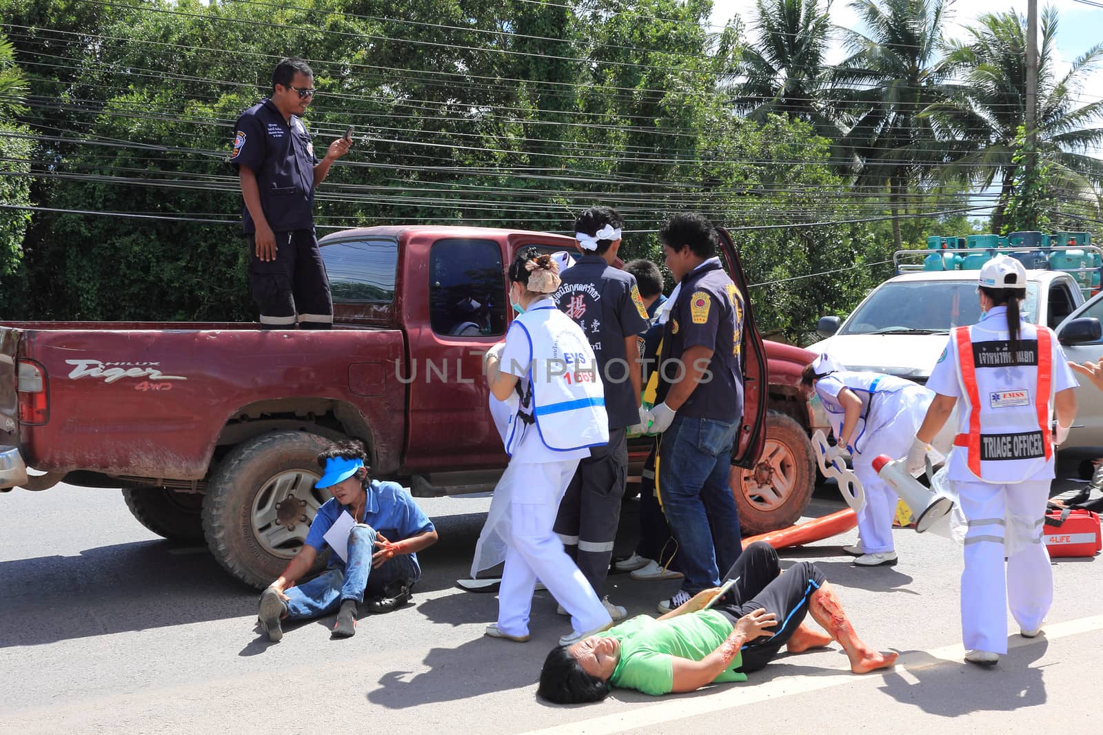 SURAT THANI, THAILAND - OCTOBER 4 : Practicing fire protection plan and rescue car accident on October 4, 2012 in Surat Thani, Thailand.