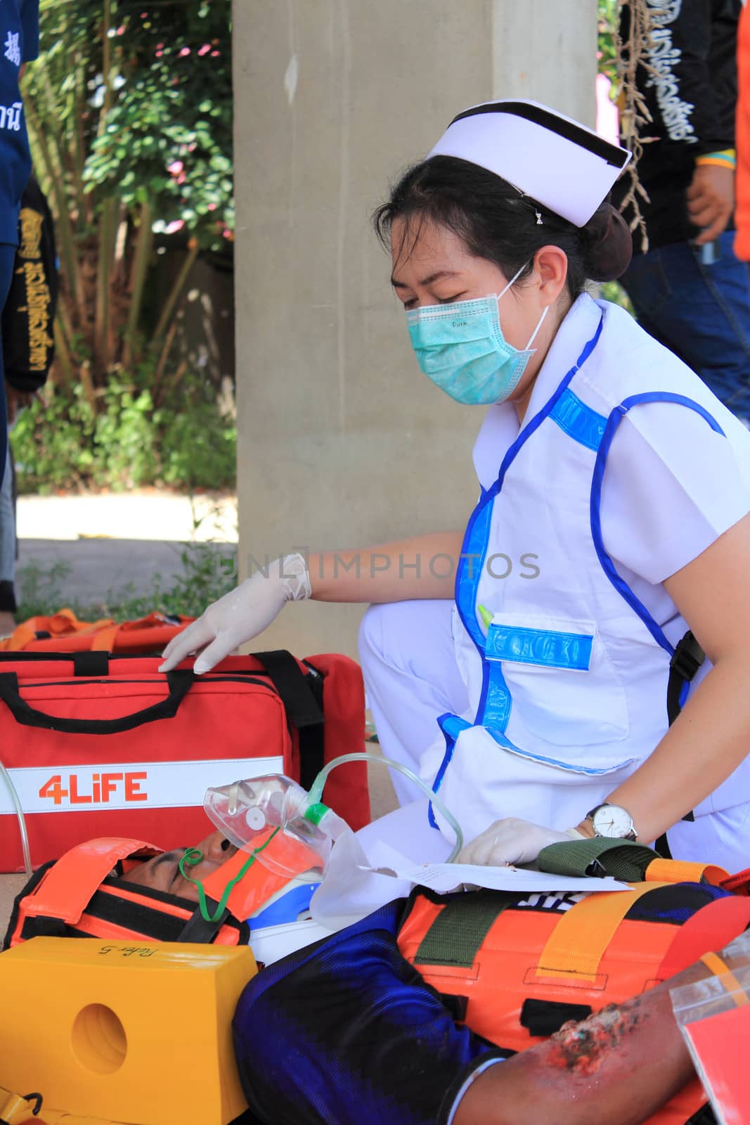 SURAT THANI, THAILAND - OCTOBER 4 : Practicing fire protection plan and rescue car accident on October 4, 2012 in Surat Thani, Thailand.