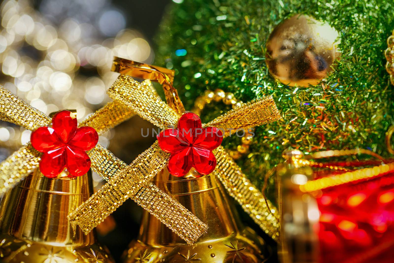 Festive Christmas golden bells photographed close-up background