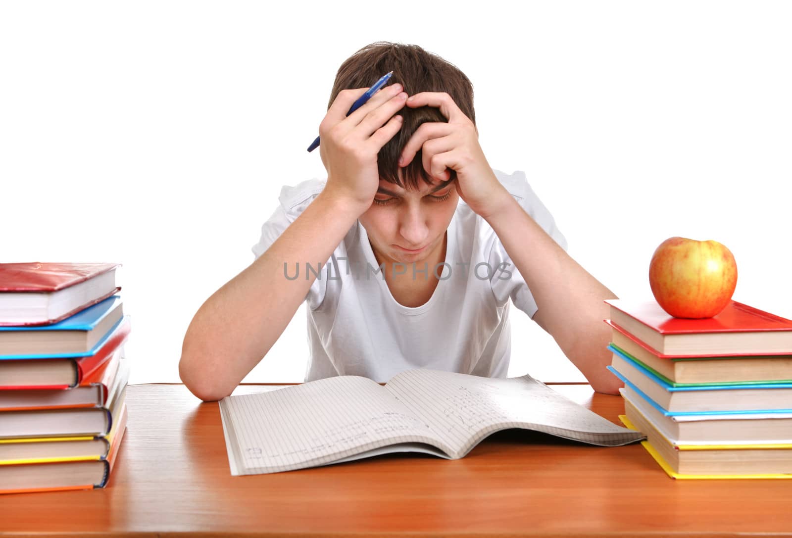 Sad and Tired Student at the Desk with many Books on the White Background
