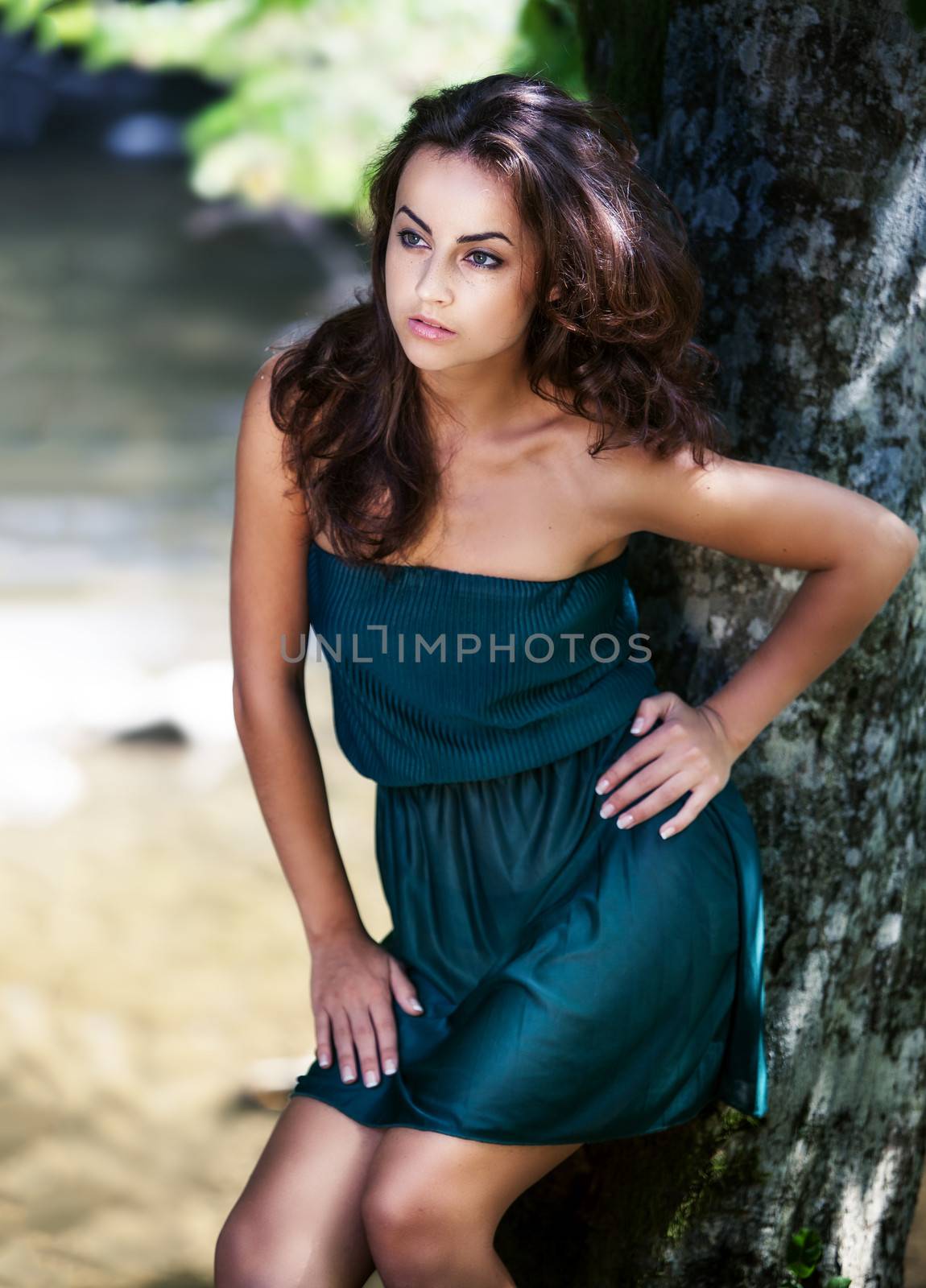 Beautiful  woman in the wood near the river by palinchak