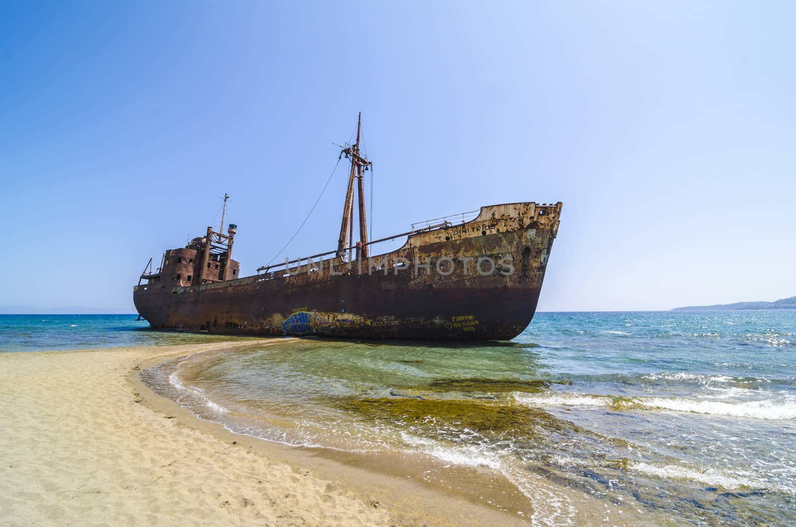 Abandoned and rusty shipwreck near Gytheio, Greece.